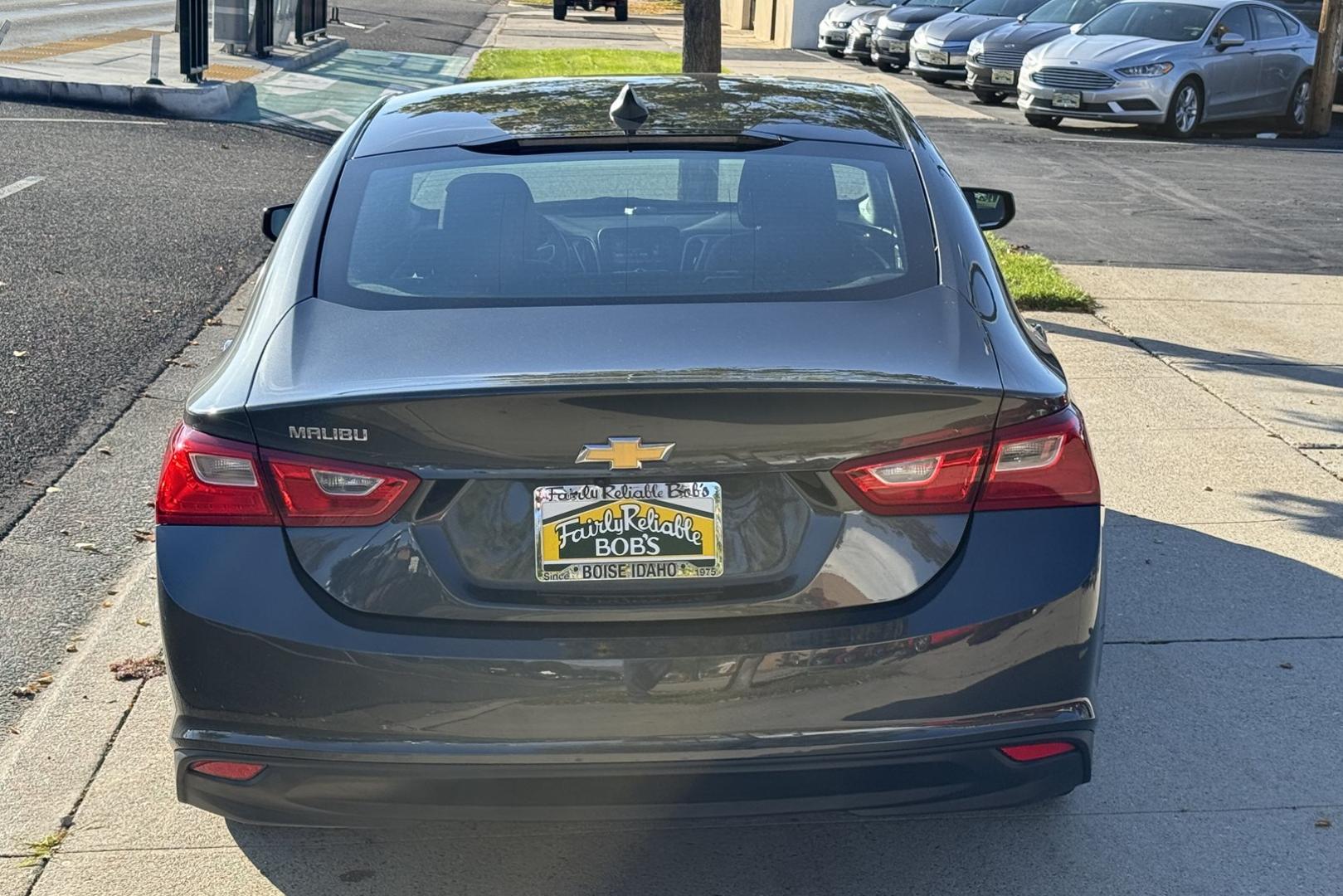 2018 Gray /Black Chevrolet Malibu LS (1G1ZC5ST8JF) with an 4 Cyl 1.5 Liter Turbo engine, Automatic 6 Speed transmission, located at 2304 W. Main St., Boise, ID, 83702, (208) 342-7777, 43.622105, -116.218658 - Great Fuel Economy! A Lot Of Leg Room Too! - Photo#2