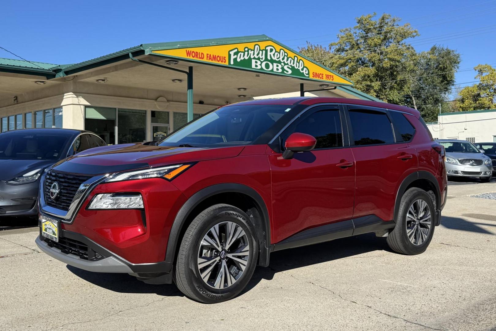 2023 Scarlet Ember /Black Nissan Rogue SV (5N1BT3BB5PC) with an 3 Cyl 1.5 Liter Turbo engine, Automatic transmission, located at 2304 W. Main St., Boise, ID, 83702, (208) 342-7777, 43.622105, -116.218658 - Great Fuel Economy & All Wheel Drive! - Photo#0