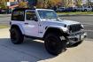 2024 White /Black Jeep Wrangler Willys (1C4PJXAG0RW) with an V6 3.6 Liter engine, 6 Speed Manual transmission, located at 2304 W. Main St., Boise, ID, 83702, (208) 342-7777, 43.622105, -116.218658 - Remaining Factory Warranty! New Tires! Manual 6 Speed Transmission! - Photo#2