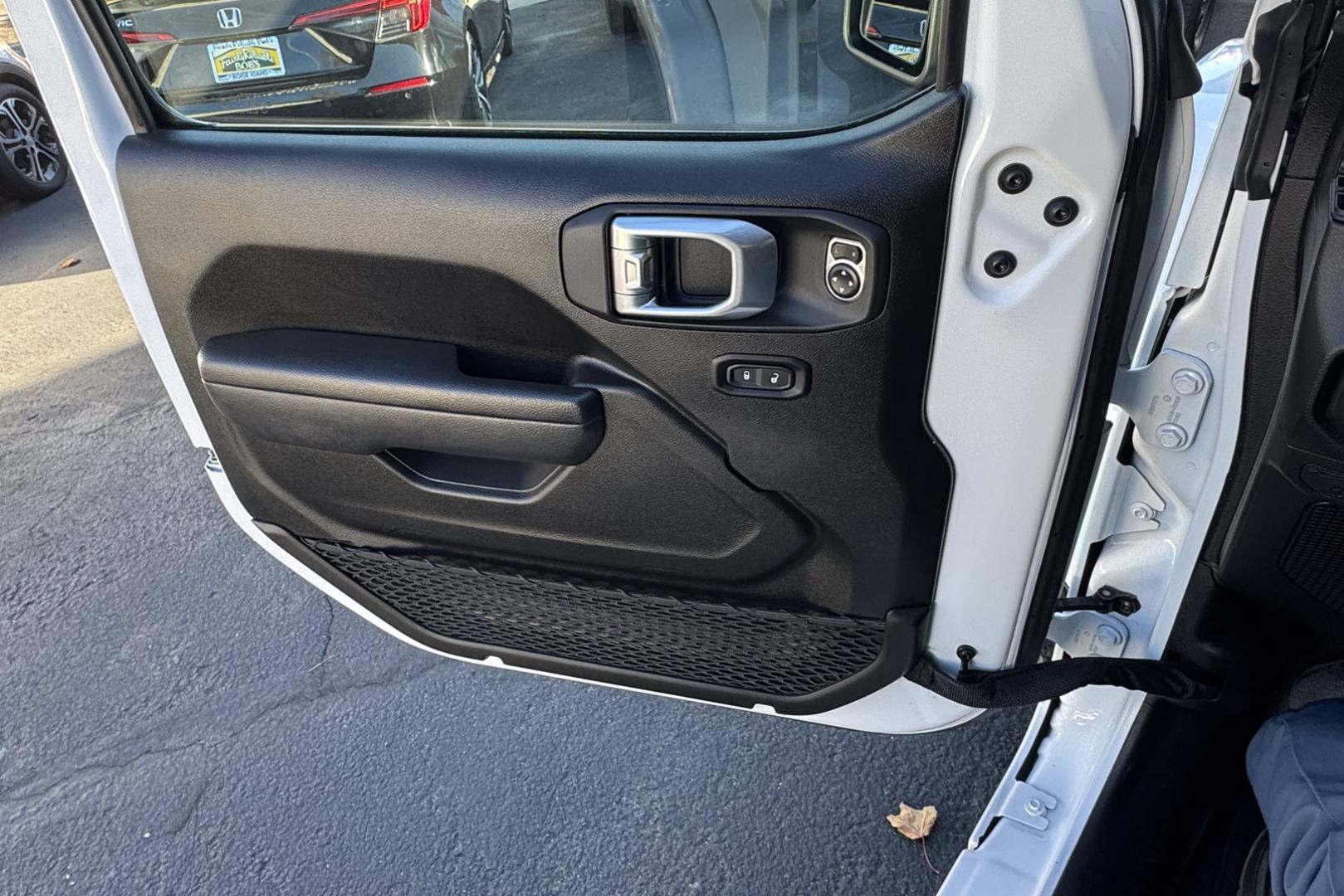 2024 White /Black Jeep Wrangler Willys (1C4PJXAG0RW) with an V6 3.6 Liter engine, 6 Speed Manual transmission, located at 2304 W. Main St., Boise, ID, 83702, (208) 342-7777, 43.622105, -116.218658 - Remaining Factory Warranty! New Tires! Manual 6 Speed Transmission! - Photo#9