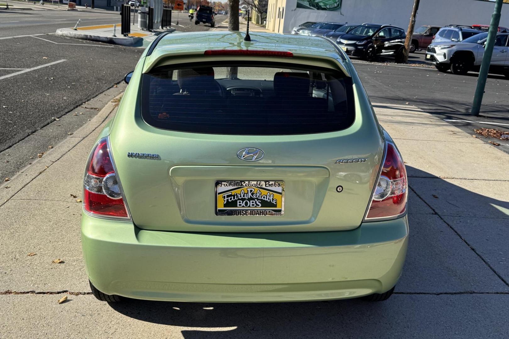 2008 Apple Green /Black Hyundai Accent GS (KMHCM36C98U) with an 4 Cyl 1.6 Liter engine, Automatic transmission, located at 2304 W. Main St., Boise, ID, 83702, (208) 342-7777, 43.622105, -116.218658 - One Of A Kind! Incredibly Low Mileage On This Gas Miser! - Photo#1