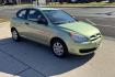 2008 Apple Green /Black Hyundai Accent GS (KMHCM36C98U) with an 4 Cyl 1.6 Liter engine, Automatic transmission, located at 2304 W. Main St., Boise, ID, 83702, (208) 342-7777, 43.622105, -116.218658 - One Of A Kind! Incredibly Low Mileage On This Gas Miser! - Photo#2