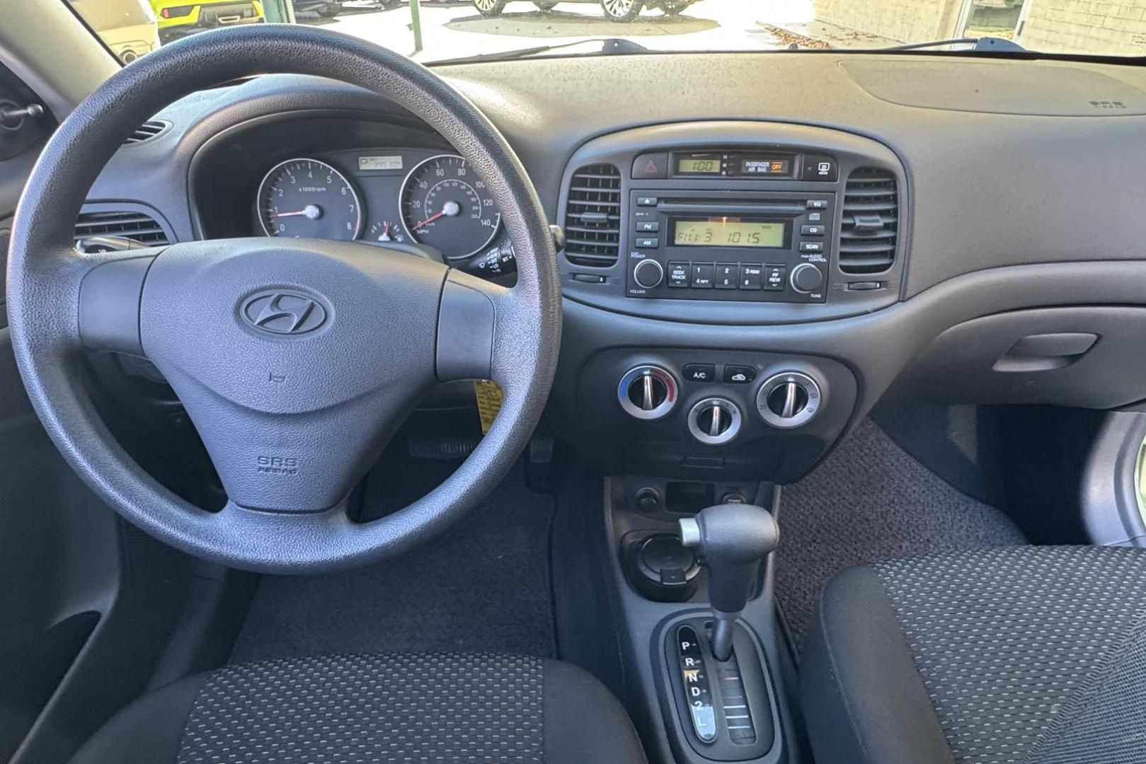 2008 Apple Green /Black Hyundai Accent GS (KMHCM36C98U) with an 4 Cyl 1.6 Liter engine, Automatic transmission, located at 2304 W. Main St., Boise, ID, 83702, (208) 342-7777, 43.622105, -116.218658 - One Of A Kind! Incredibly Low Mileage On This Gas Miser! - Photo#11