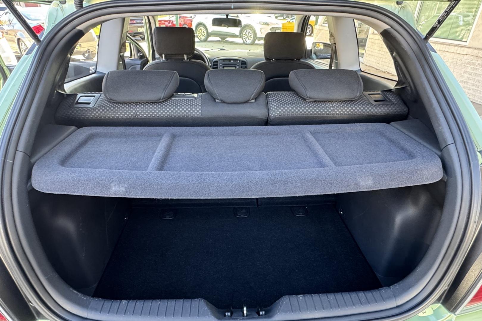 2008 Apple Green /Black Hyundai Accent GS (KMHCM36C98U) with an 4 Cyl 1.6 Liter engine, Automatic transmission, located at 2304 W. Main St., Boise, ID, 83702, (208) 342-7777, 43.622105, -116.218658 - One Of A Kind! Incredibly Low Mileage On This Gas Miser! - Photo#12