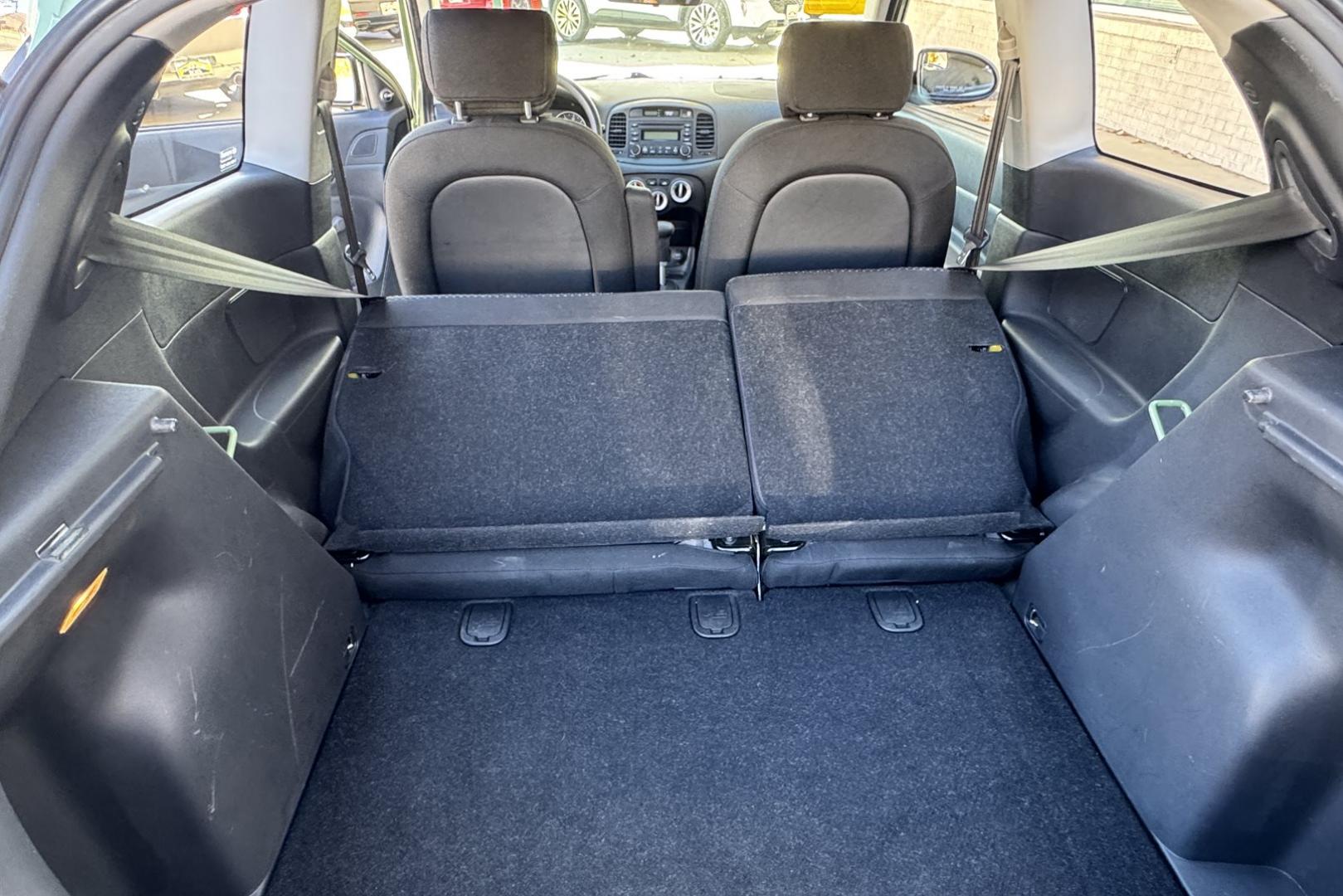 2008 Apple Green /Black Hyundai Accent GS (KMHCM36C98U) with an 4 Cyl 1.6 Liter engine, Automatic transmission, located at 2304 W. Main St., Boise, ID, 83702, (208) 342-7777, 43.622105, -116.218658 - One Of A Kind! Incredibly Low Mileage On This Gas Miser! - Photo#15