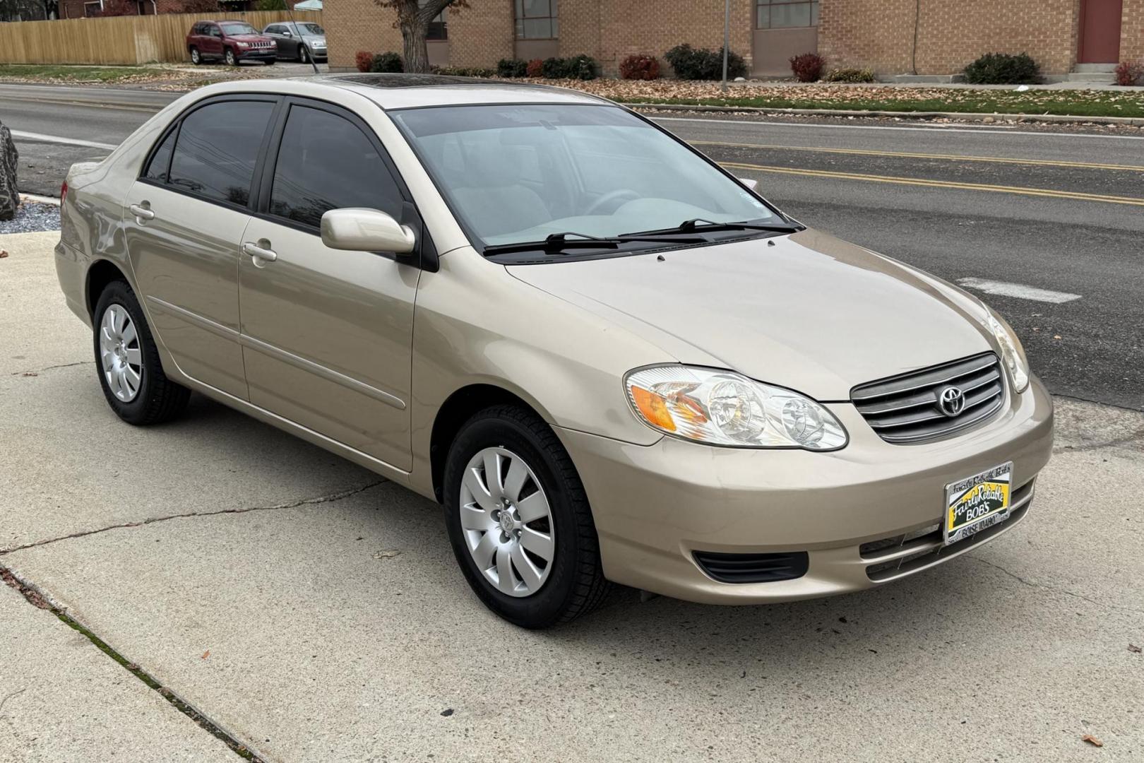 2004 Gold /Tan Toyota Corolla LE (1NXBR38E24Z) with an 4 Cyl 1.8 Liter engine, 5 Speed transmission, located at 2304 W. Main St., Boise, ID, 83702, (208) 342-7777, 43.622105, -116.218658 - Local One Owner Boise Car! 25k Actual Mileage! - Photo#2