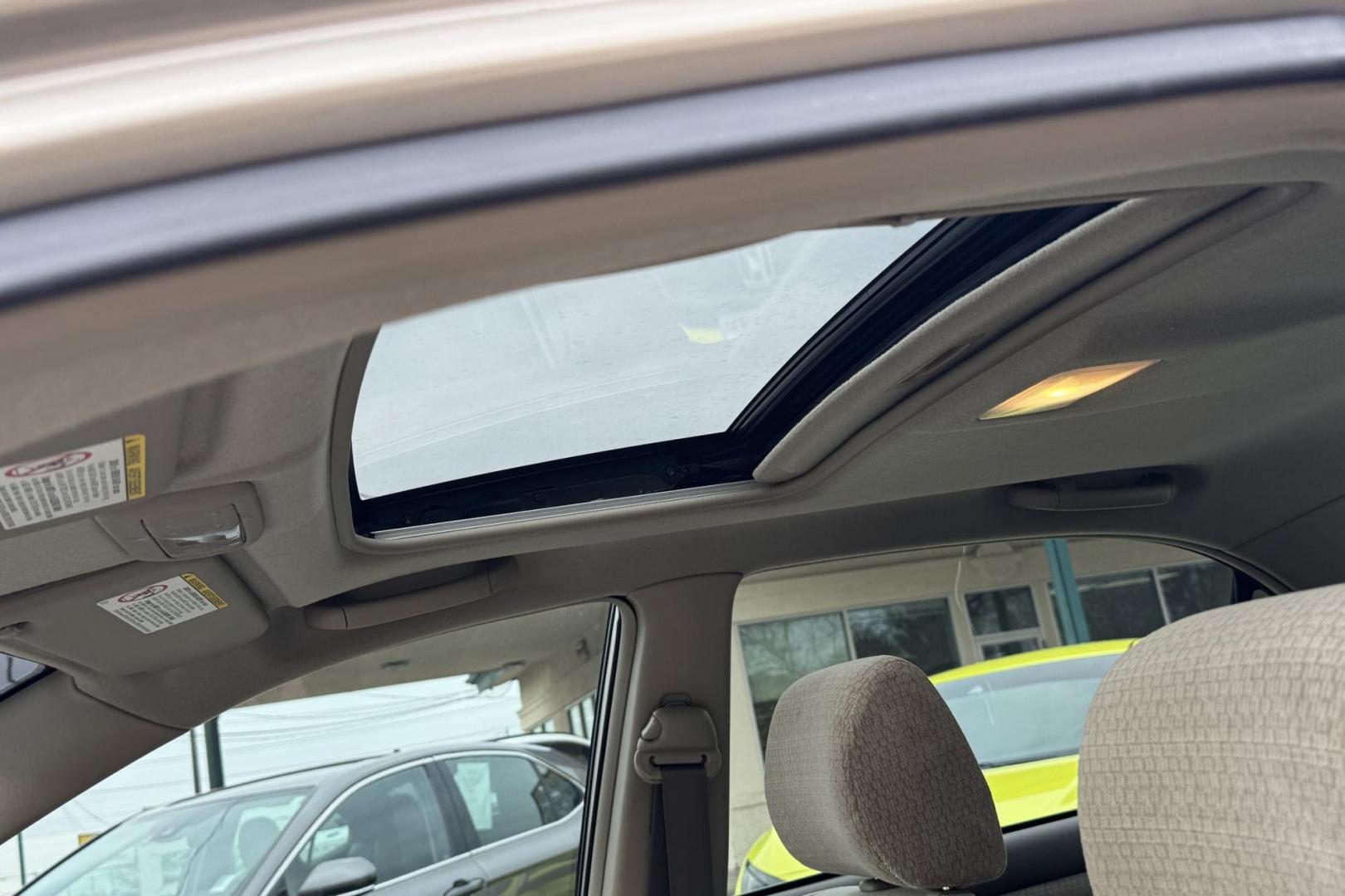 2004 Gold /Tan Toyota Corolla LE (1NXBR38E24Z) with an 4 Cyl 1.8 Liter engine, 5 Speed transmission, located at 2304 W. Main St., Boise, ID, 83702, (208) 342-7777, 43.622105, -116.218658 - Local One Owner Boise Car! 25k Actual Mileage! - Photo#4