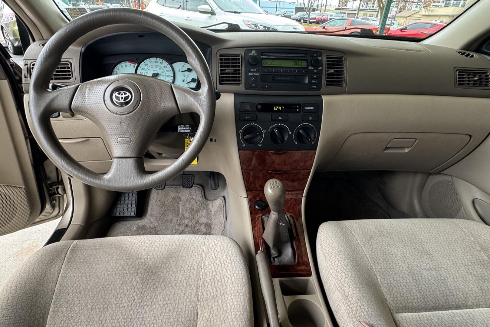 2004 Gold /Tan Toyota Corolla LE (1NXBR38E24Z) with an 4 Cyl 1.8 Liter engine, 5 Speed transmission, located at 2304 W. Main St., Boise, ID, 83702, (208) 342-7777, 43.622105, -116.218658 - Local One Owner Boise Car! 25k Actual Mileage! - Photo#7