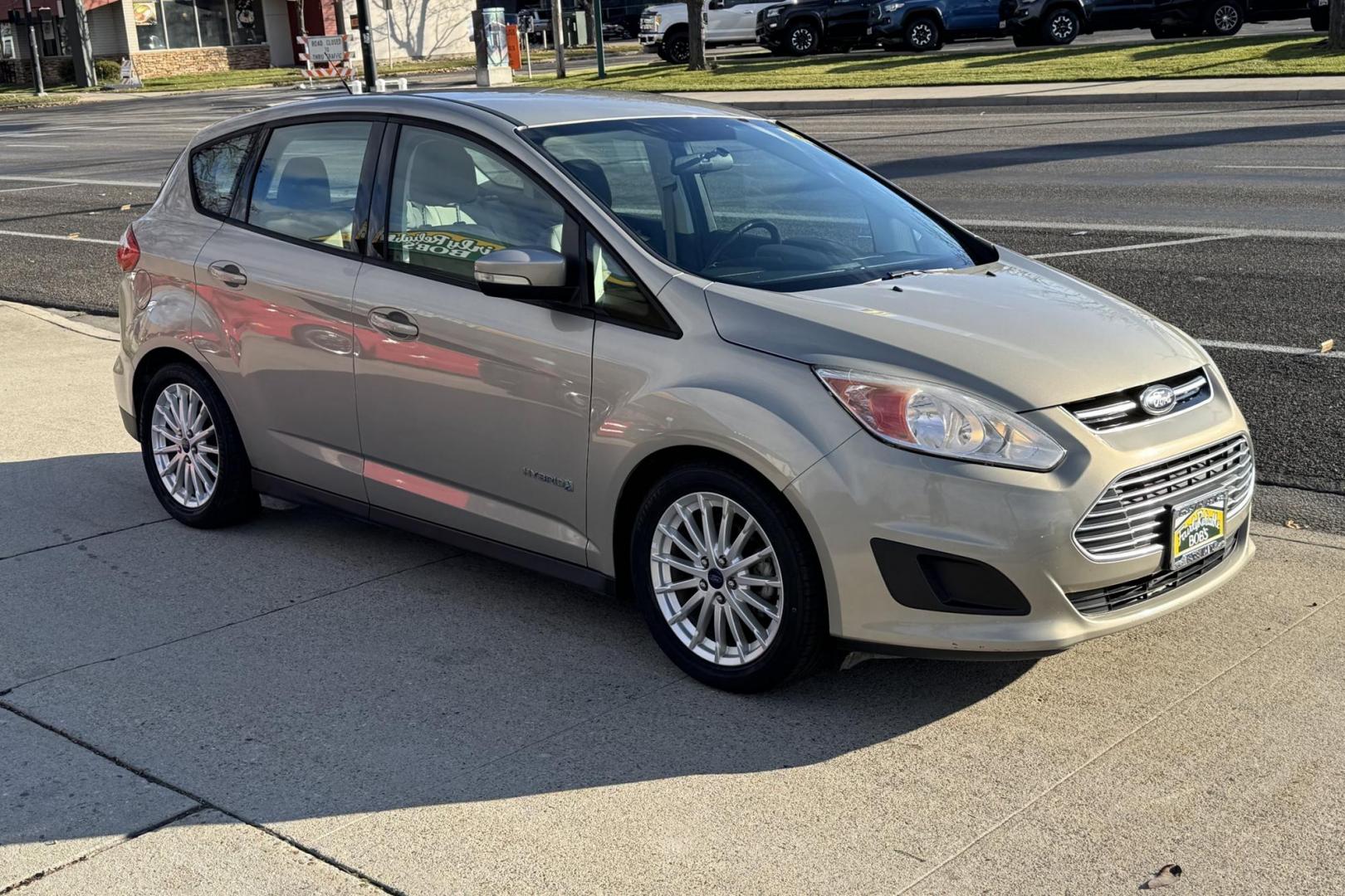 2015 Tectonic Silver Metallic /Camel Ford C-Max SE (1FADP5AU3FL) with an 4 Cyl 2.0 Liter Hybrid engine, Automatic transmission, located at 2304 W. Main St., Boise, ID, 83702, (208) 342-7777, 43.622105, -116.218658 - New Tires! Great Fuel Economy! - Photo#2