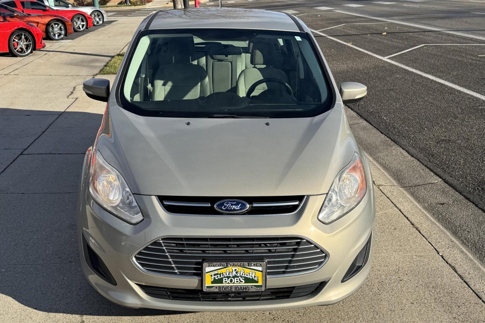 2015 Tectonic Silver Metallic /Camel Ford C-Max SE (1FADP5AU3FL) with an 4 Cyl 2.0 Liter Hybrid engine, Automatic transmission, located at 2304 W. Main St., Boise, ID, 83702, (208) 342-7777, 43.622105, -116.218658 - New Tires! Great Fuel Economy! - Photo#3