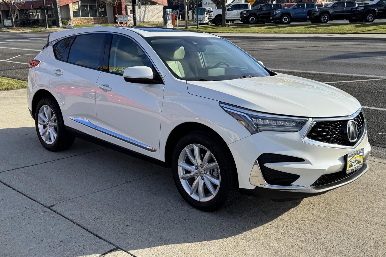2019 White Diamond Pearl /Parchment Acura RDX SH-AWD (5J8TC2H37KL) with an 4 Cyl 2.0 Liter Turbo engine, Automatic 10 Speed transmission, located at 2304 W. Main St., Boise, ID, 83702, (208) 342-7777, 43.622105, -116.218658 - Highly Optioned And Fun To Drive! - Photo#2