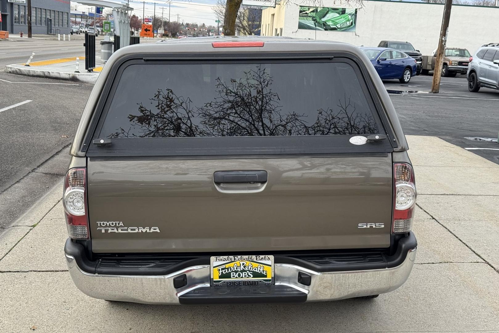 2011 Pyrite Mica /Gray Toyota Tacoma (5TFTX4CN0BX) with an 4 Cyl 2.7 Liter engine, Automatic transmission, located at 2304 W. Main St., Boise, ID, 83702, (208) 342-7777, 43.622105, -116.218658 - Own The Legend! - Photo#1
