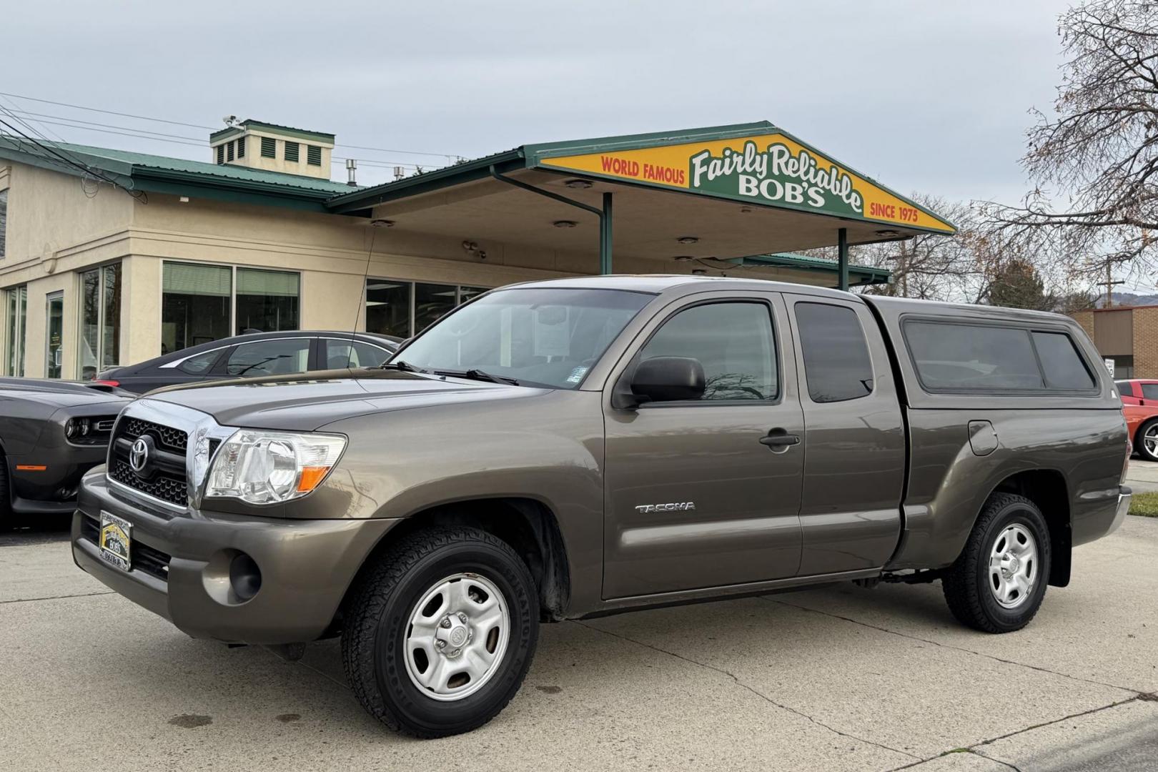 2011 Pyrite Mica /Gray Toyota Tacoma (5TFTX4CN0BX) with an 4 Cyl 2.7 Liter engine, Automatic transmission, located at 2304 W. Main St., Boise, ID, 83702, (208) 342-7777, 43.622105, -116.218658 - Own The Legend! - Photo#0
