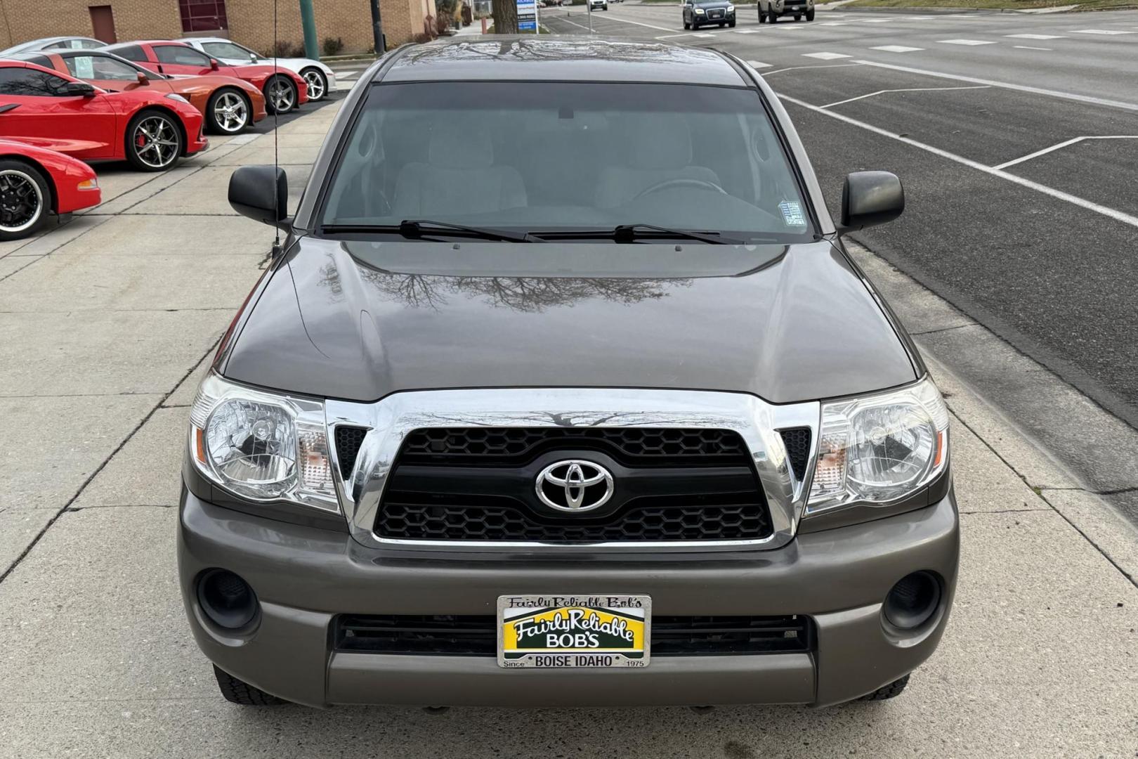 2011 Pyrite Mica /Gray Toyota Tacoma (5TFTX4CN0BX) with an 4 Cyl 2.7 Liter engine, Automatic transmission, located at 2304 W. Main St., Boise, ID, 83702, (208) 342-7777, 43.622105, -116.218658 - Own The Legend! - Photo#3