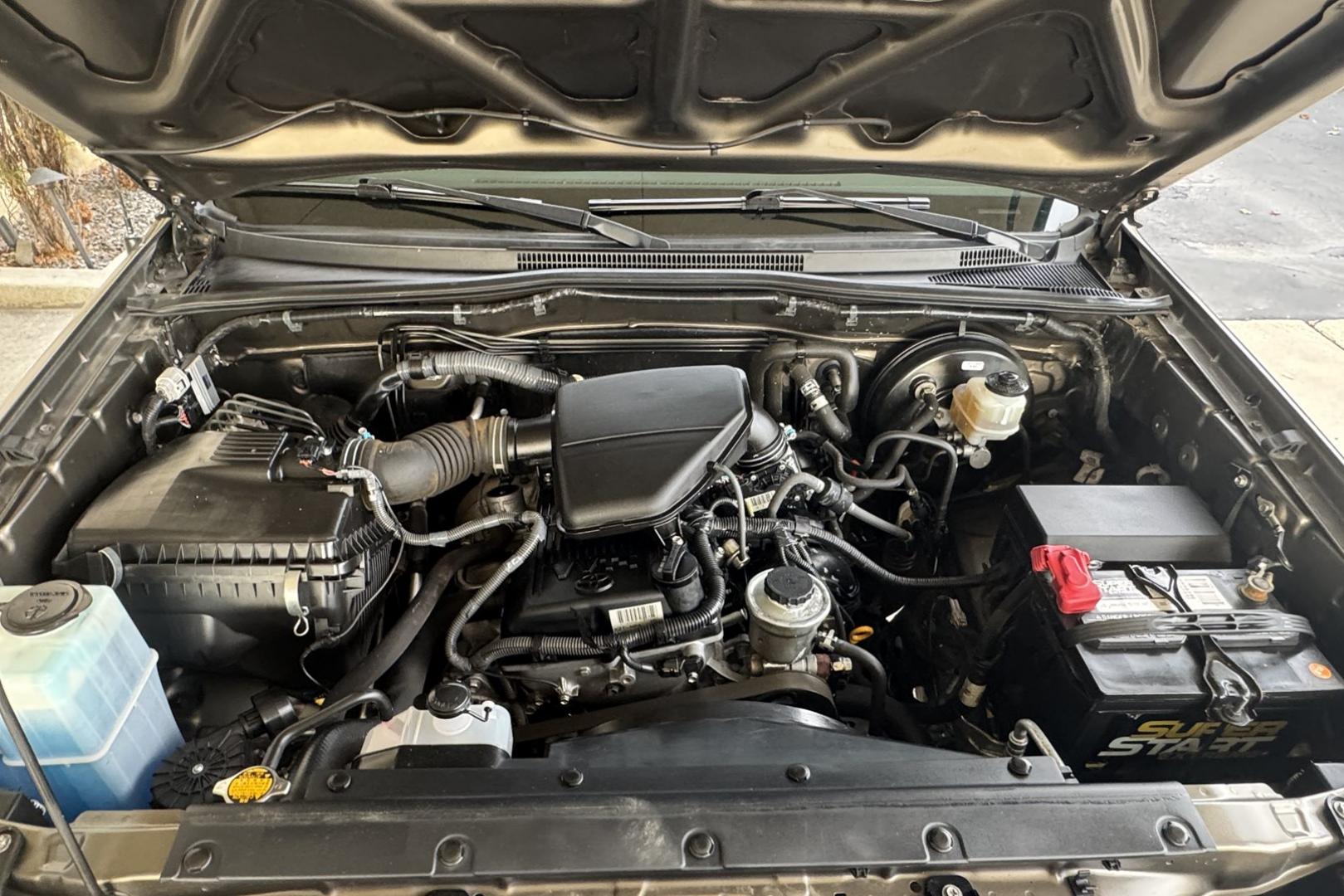 2011 Pyrite Mica /Gray Toyota Tacoma (5TFTX4CN0BX) with an 4 Cyl 2.7 Liter engine, Automatic transmission, located at 2304 W. Main St., Boise, ID, 83702, (208) 342-7777, 43.622105, -116.218658 - Own The Legend! - Photo#9