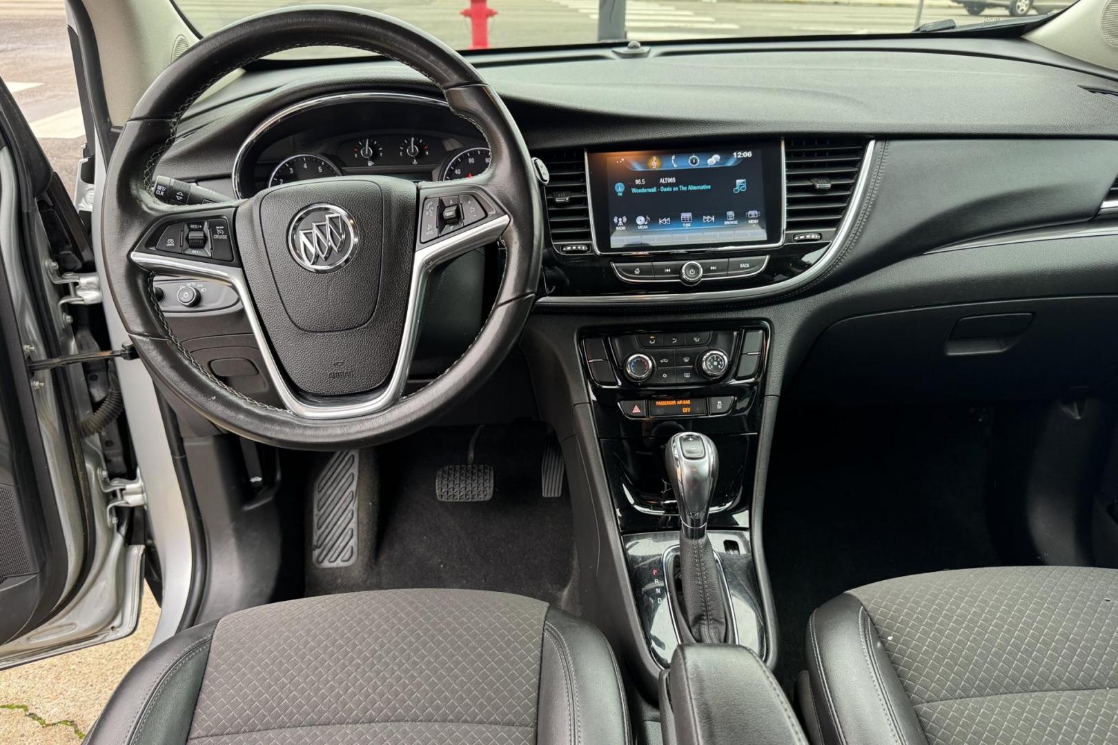 2018 Silver /Black Buick Encore Preferred (KL4CJASB3JB) with an 4 Cyl 1.4 Liter Turbo engine, Automatic 6 Speed transmission, located at 2304 W. Main St., Boise, ID, 83702, (208) 342-7777, 43.622105, -116.218658 - Great Fuel Economy! - Photo#9