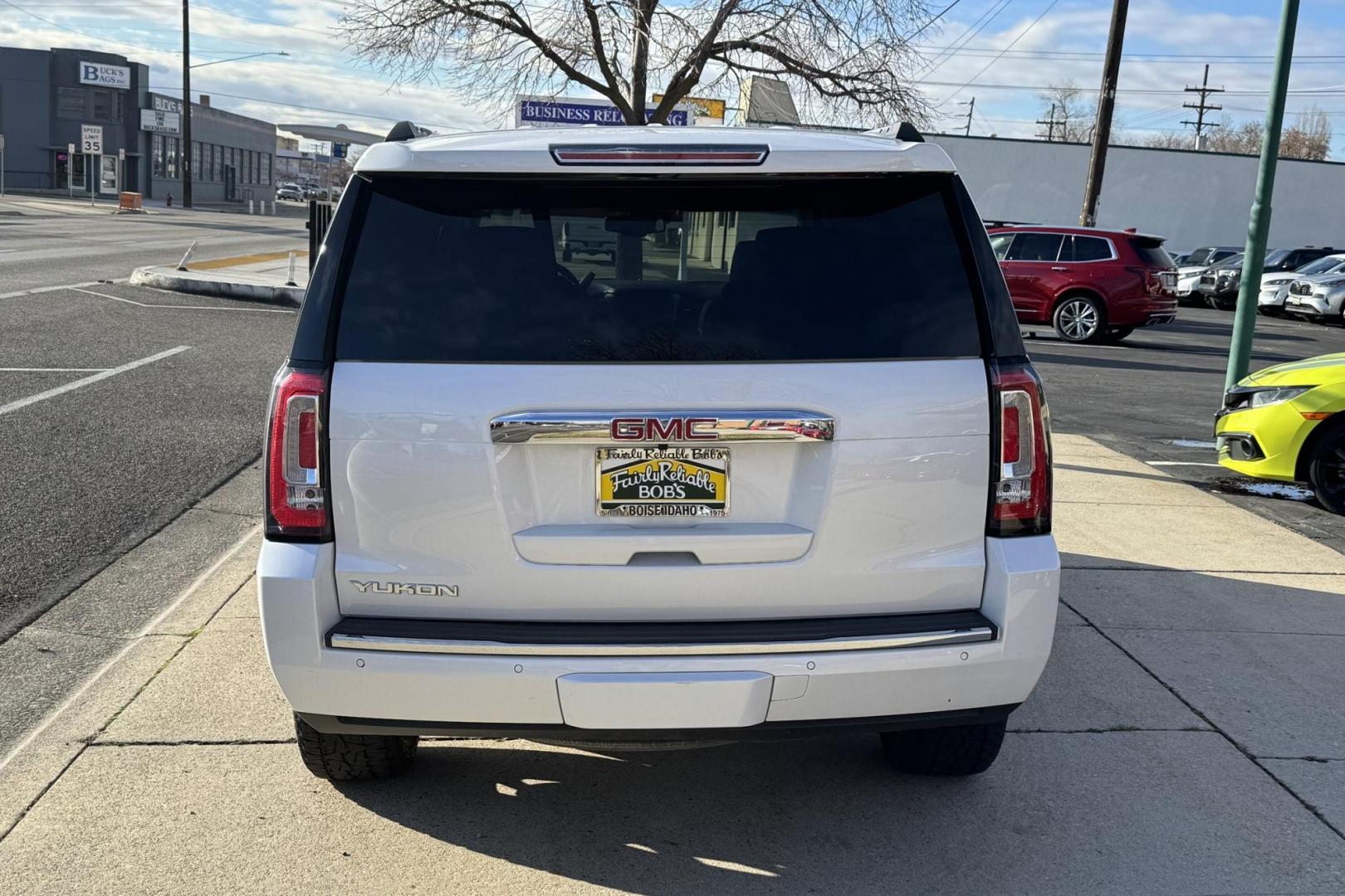 2019 White Diamond Pearl /Dune GMC Yukon Denali (1GKS2CKJ5KR) with an V8 6.2 Liter engine, Automatic 10 Speed transmission, located at 2304 W. Main St., Boise, ID, 83702, (208) 342-7777, 43.622105, -116.218658 - 7 Passenger! Power Rear 3rd Row Seating! Very, Very Nice! - Photo#1