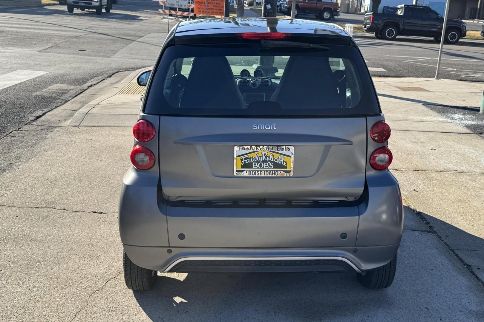 2013 Gray /Black Smart Fortwo Passion (WMEEJ3BA1DK) with an 1.0L L3 DOHC 12V engine, 5-Speed Automatic transmission, located at 2304 W. Main St., Boise, ID, 83702, (208) 342-7777, 43.622105, -116.218658 - Looking for easy parking and great gas mileage? This is it! - Photo#1