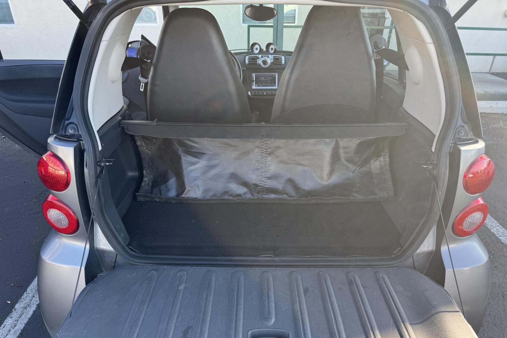 2013 Gray /Black Smart Fortwo Passion (WMEEJ3BA1DK) with an 1.0L L3 DOHC 12V engine, 5-Speed Automatic transmission, located at 2304 W. Main St., Boise, ID, 83702, (208) 342-7777, 43.622105, -116.218658 - Looking for easy parking and great gas mileage? This is it! - Photo#11