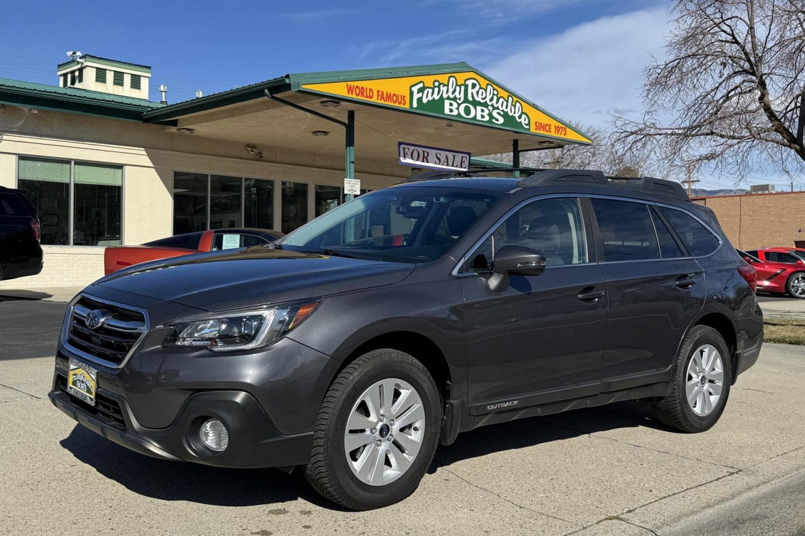 2019 Magnetite Gray Metallic /Black Subaru Outback Premium (4S4BSAHC0K3) with an H4 2.5 Liter engine, Automatic transmission, located at 2304 W. Main St., Boise, ID, 83702, (208) 342-7777, 43.622105, -116.218658 - Sunroof! Eye Sight Package! Legendary Subaru Quality! - Photo#0