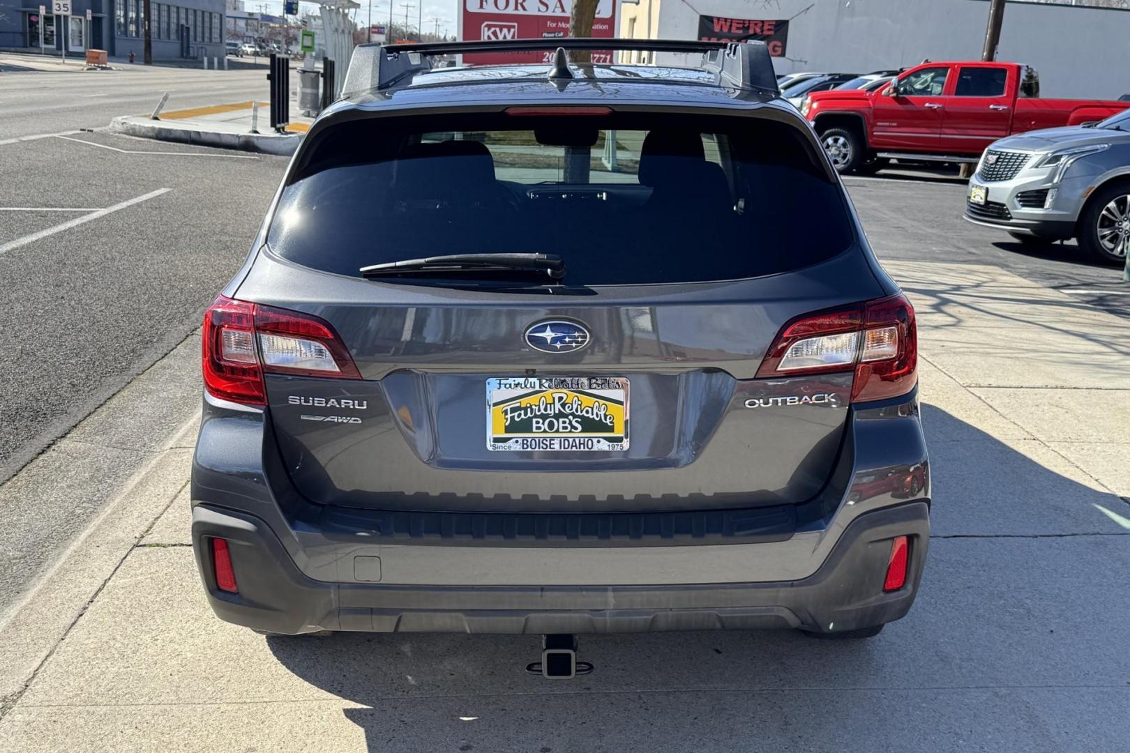 2019 Magnetite Gray Metallic /Black Subaru Outback Premium (4S4BSAHC0K3) with an H4 2.5 Liter engine, Automatic transmission, located at 2304 W. Main St., Boise, ID, 83702, (208) 342-7777, 43.622105, -116.218658 - Sunroof! Eye Sight Package! Legendary Subaru Quality! - Photo#1