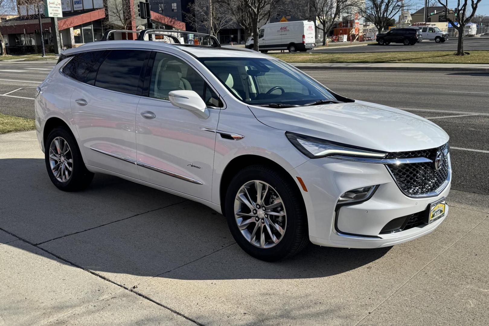 2022 White Frost Tintcoat /Chestnut/Ebony Buick Enclave Avenir (5GAEVCKW7NJ) with an V6 3.6 Liter engine, Automatic 9 Speed transmission, located at 2304 W. Main St., Boise, ID, 83702, (208) 342-7777, 43.622105, -116.218658 - Highly Optioned With Safety, Comfort And Power! - Photo#2