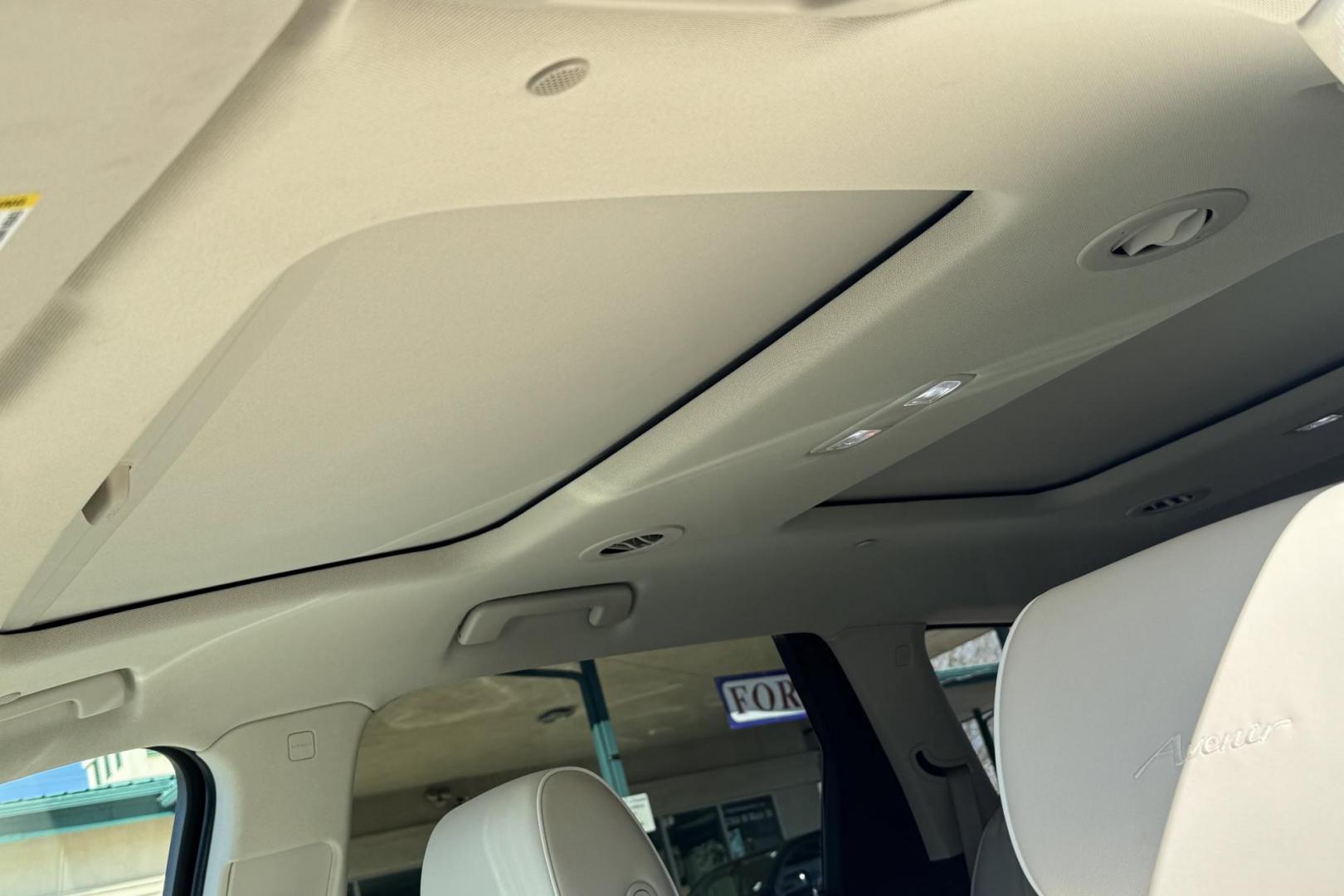 2022 White Frost Tintcoat /Chestnut/Ebony Buick Enclave Avenir (5GAEVCKW7NJ) with an V6 3.6 Liter engine, Automatic 9 Speed transmission, located at 2304 W. Main St., Boise, ID, 83702, (208) 342-7777, 43.622105, -116.218658 - Highly Optioned With Safety, Comfort And Power! - Photo#6