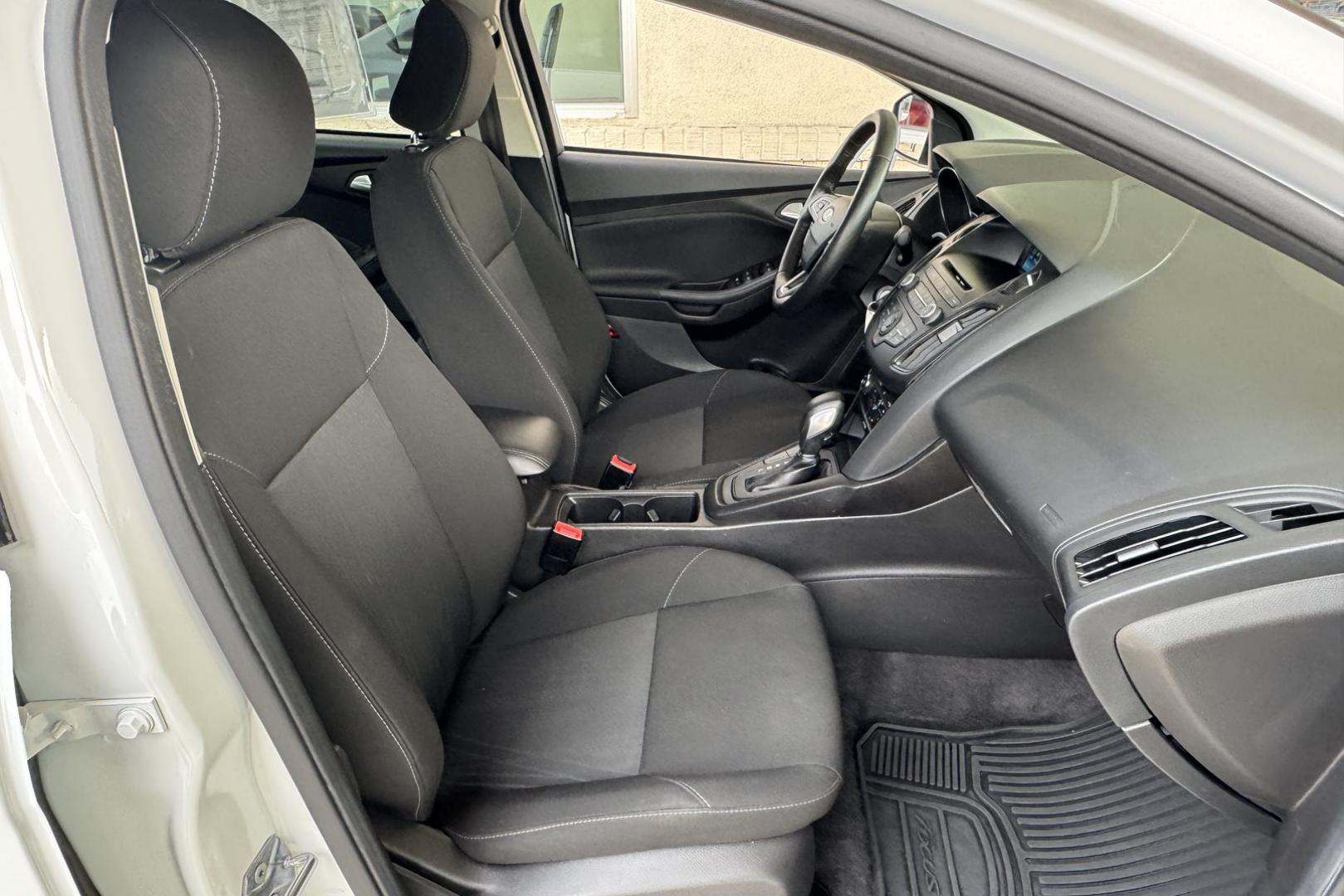 2017 Oxford White /Black Ford Focus SE (1FADP3F25HL) with an 4 Cyl 2.0 Liter engine, Automatic 6 Speed transmission, located at 2304 W. Main St., Boise, ID, 83702, (208) 342-7777, 43.622105, -116.218658 - Photo#11