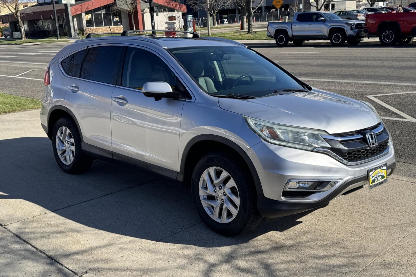 2016 Silver /Gray Honda CR-V EX-L (2HKRM4H76GH) with an 4 Cyl 2.4 Liter engine, Automatic transmission, located at 2304 W. Main St., Boise, ID, 83702, (208) 342-7777, 43.622105, -116.218658 - Extremely Clean CR-V EX-L With New Tires Too! - Photo#2