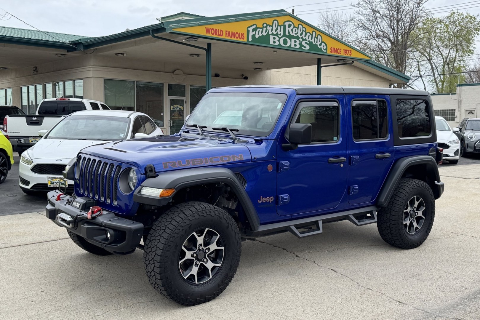2018 Hydro Blue Pearl /Black Jeep Wrangler Unlimited Rubicon (1C4HJXFGXJW) with an V6 3.6 Liter engine, Automatic 8 Speed transmission, located at 2304 W. Main St., Boise, ID, 83702, (208) 342-7777, 43.622105, -116.218658 - Stunning And Capable Wrangler Rubicon! - Photo#0
