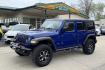 2018 Hydro Blue Pearl /Black Jeep Wrangler Unlimited Rubicon (1C4HJXFGXJW) with an V6 3.6 Liter engine, Automatic 8 Speed transmission, located at 2304 W. Main St., Boise, ID, 83702, (208) 342-7777, 43.622105, -116.218658 - Stunning And Capable Wrangler Rubicon! - Photo#0