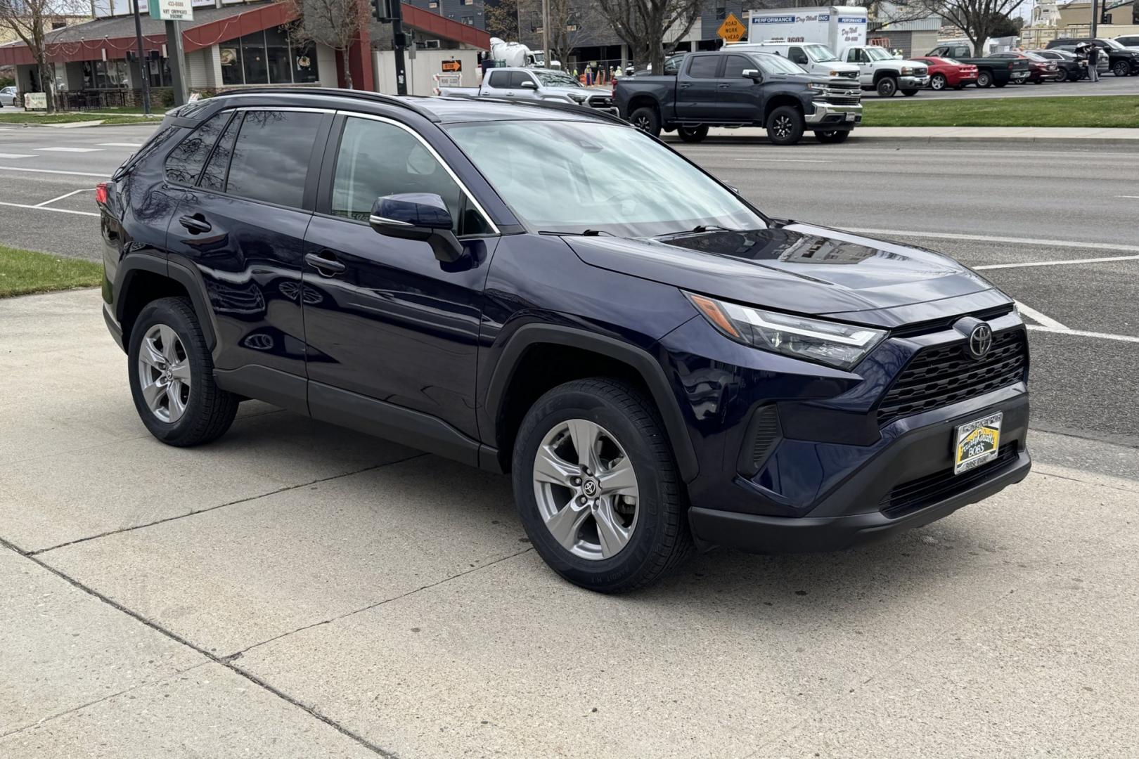 2022 Blue /Black Toyota RAV4 XLE (2T3P1RFV7NW) with an 4 Cyl 2.5 Liter engine, Automatic 8 Speed transmission, located at 2304 W. Main St., Boise, ID, 83702, (208) 342-7777, 43.622105, -116.218658 - All Wheel Drive RAV4! New Tires! Ready To Go! - Photo#2