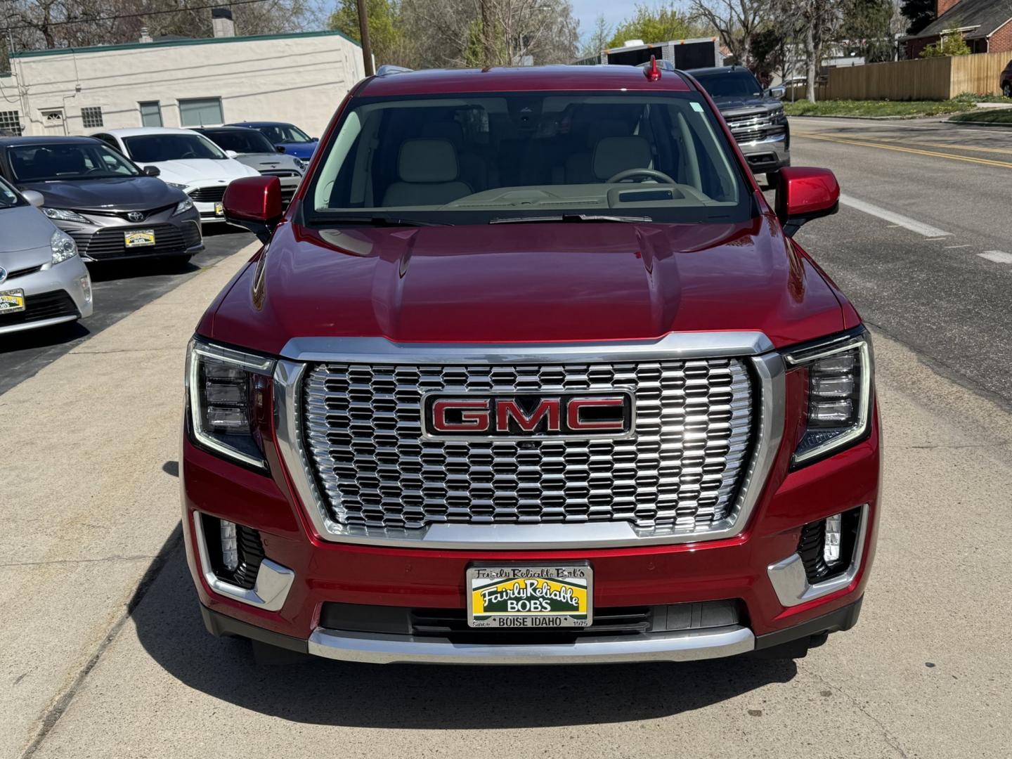 2022 Cayenne Red /Teak/Light Shale GMC Yukon Denali (1GKS2DKL4NR) with an V8 6.2 Liter engine, Automatic 10 Speed transmission, located at 2304 W. Main St., Boise, ID, 83702, (208) 342-7777, 43.622105, -116.218658 - Stunning 1 Owner, Idaho Owned Denali! - Photo#3