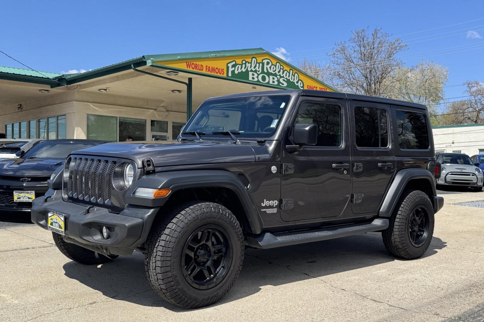 2018 Gray /Black Jeep Wrangler Unlimited Sport (1C4HJXDG1JW) with an V6 3.6 Liter engine, Automatic 8 Speed transmission, located at 2304 W. Main St., Boise, ID, 83702, (208) 342-7777, 43.622105, -116.218658 - Removable Hard Top! - Photo#0