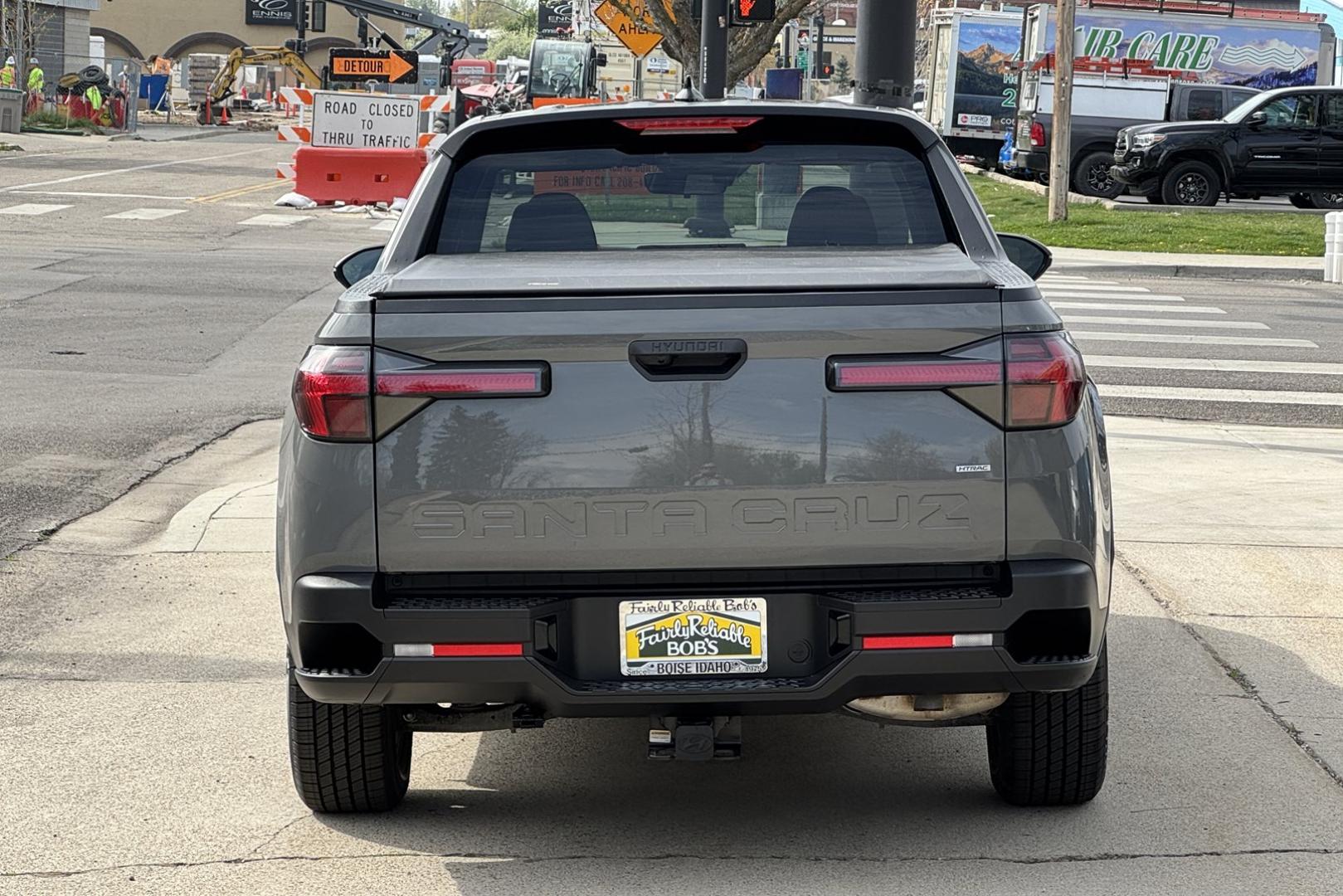 2022 Hampton Gray Metallic /Black Hyundai Santa Cruz SEL (5NTJBDAE9NH) with an 4 Cyl 2.5 Liter engine, Automatic 8 Speed transmission, located at 2304 W. Main St., Boise, ID, 83702, (208) 342-7777, 43.622105, -116.218658 - Truck, Passenger Vehicle And Fuel Economy All In One! - Photo#1