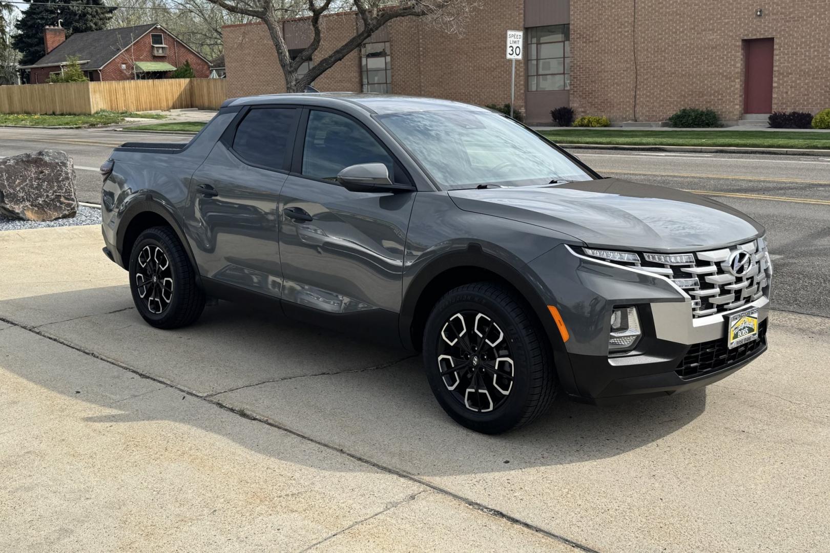 2022 Hampton Gray Metallic /Black Hyundai Santa Cruz SEL (5NTJBDAE9NH) with an 4 Cyl 2.5 Liter engine, Automatic 8 Speed transmission, located at 2304 W. Main St., Boise, ID, 83702, (208) 342-7777, 43.622105, -116.218658 - Truck, Passenger Vehicle And Fuel Economy All In One! - Photo#2