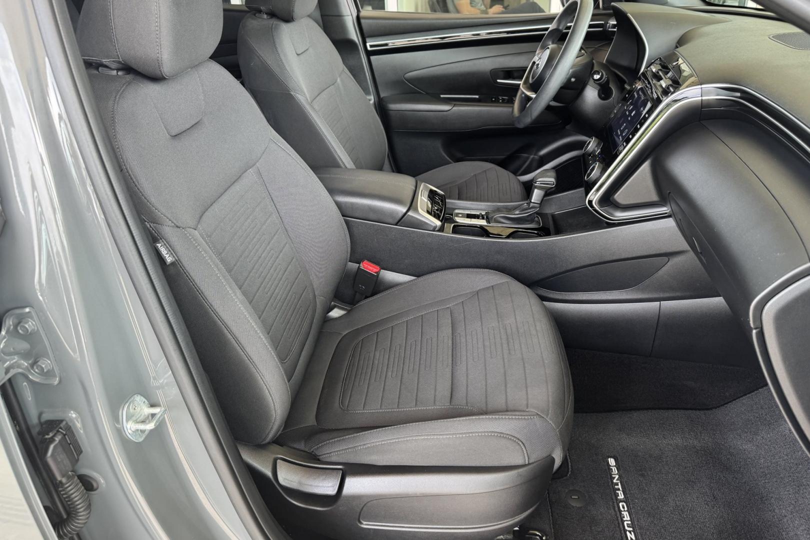 2022 Hampton Gray Metallic /Black Hyundai Santa Cruz SEL (5NTJBDAE9NH) with an 4 Cyl 2.5 Liter engine, Automatic 8 Speed transmission, located at 2304 W. Main St., Boise, ID, 83702, (208) 342-7777, 43.622105, -116.218658 - Truck, Passenger Vehicle And Fuel Economy All In One! - Photo#16