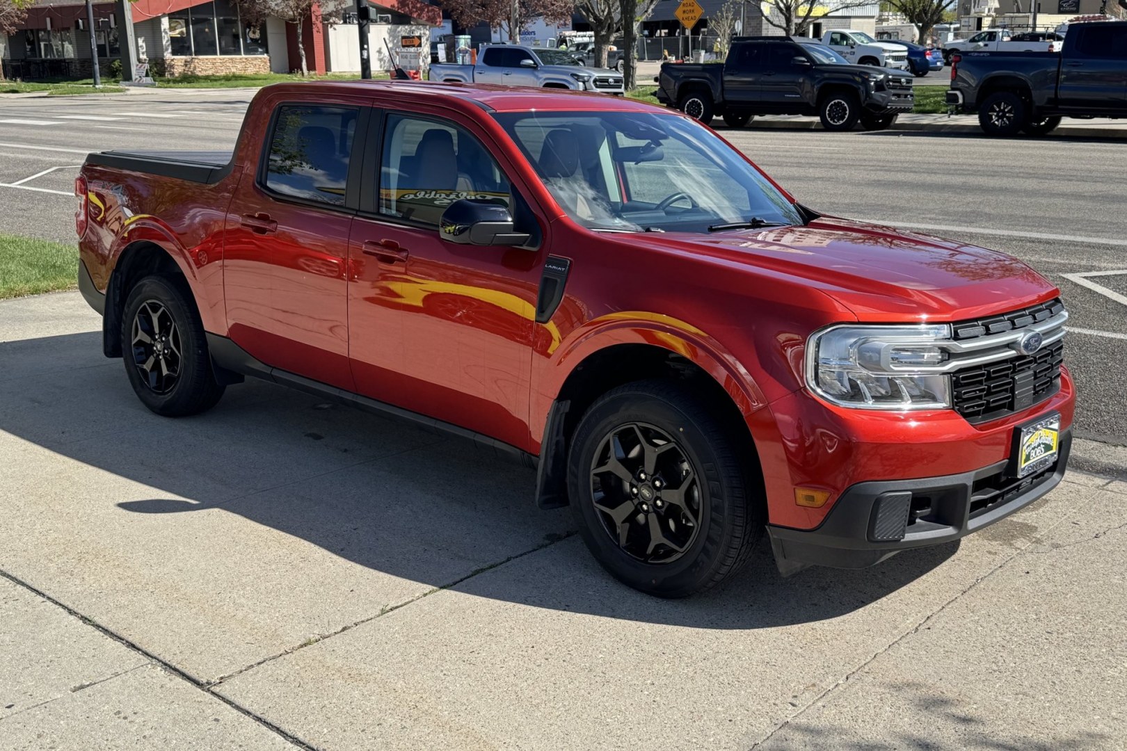 2024 Hot Pepper Red Metallic /Desert Brown Ford Maverick Lariat (3FTTW8S95RR) with an 4 Cyl 2.0 Liter Turbo engine, Automatic 8 Speed transmission, located at 2304 W. Main St., Boise, ID, 83702, (208) 342-7777, 43.622105, -116.218658 - New Tires! A Lot Of Safety Options And Great Fuel Economy! - Photo#2