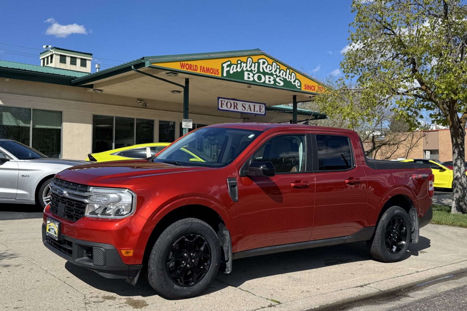 2024 Hot Pepper Red Metallic /Desert Brown Ford Maverick Lariat (3FTTW8S95RR) with an 4 Cyl 2.0 Liter Turbo engine, Automatic 8 Speed transmission, located at 2304 W. Main St., Boise, ID, 83702, (208) 342-7777, 43.622105, -116.218658 - New Tires! A Lot Of Safety Options And Great Fuel Economy! - Photo#0