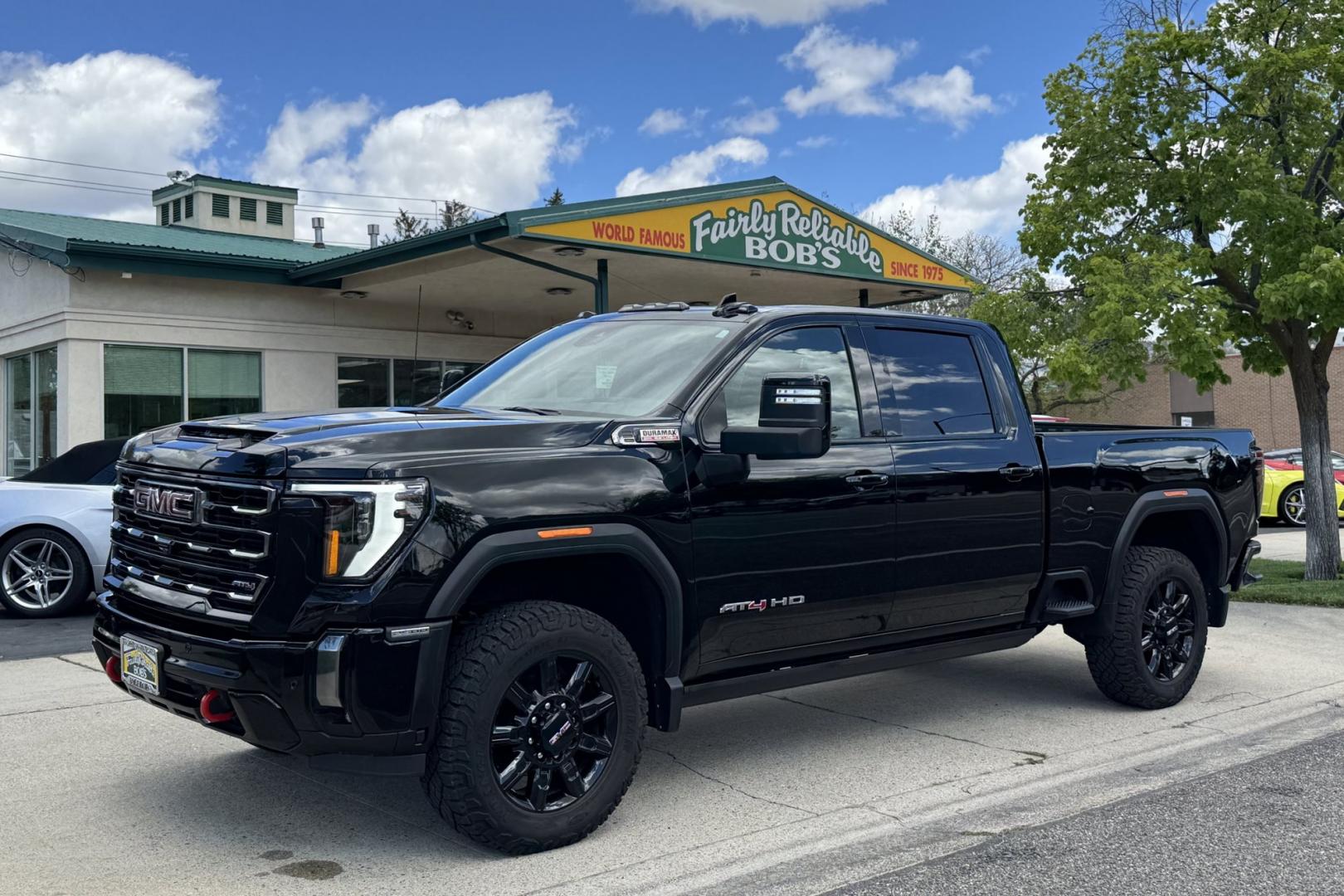 2024 Onyx Black /Jet Black With Kalahari Accents GMC Sierra 2500HD AT4 (1GT49PEY3RF) with an V8 6.6 Liter Duramax Turbo Diesel engine, Allison 10 Speed Automatic transmission, located at 2304 W. Main St., Boise, ID, 83702, (208) 342-7777, 43.622105, -116.218658 - Stunning And Capable Duramax Powered GMC! - Photo#0