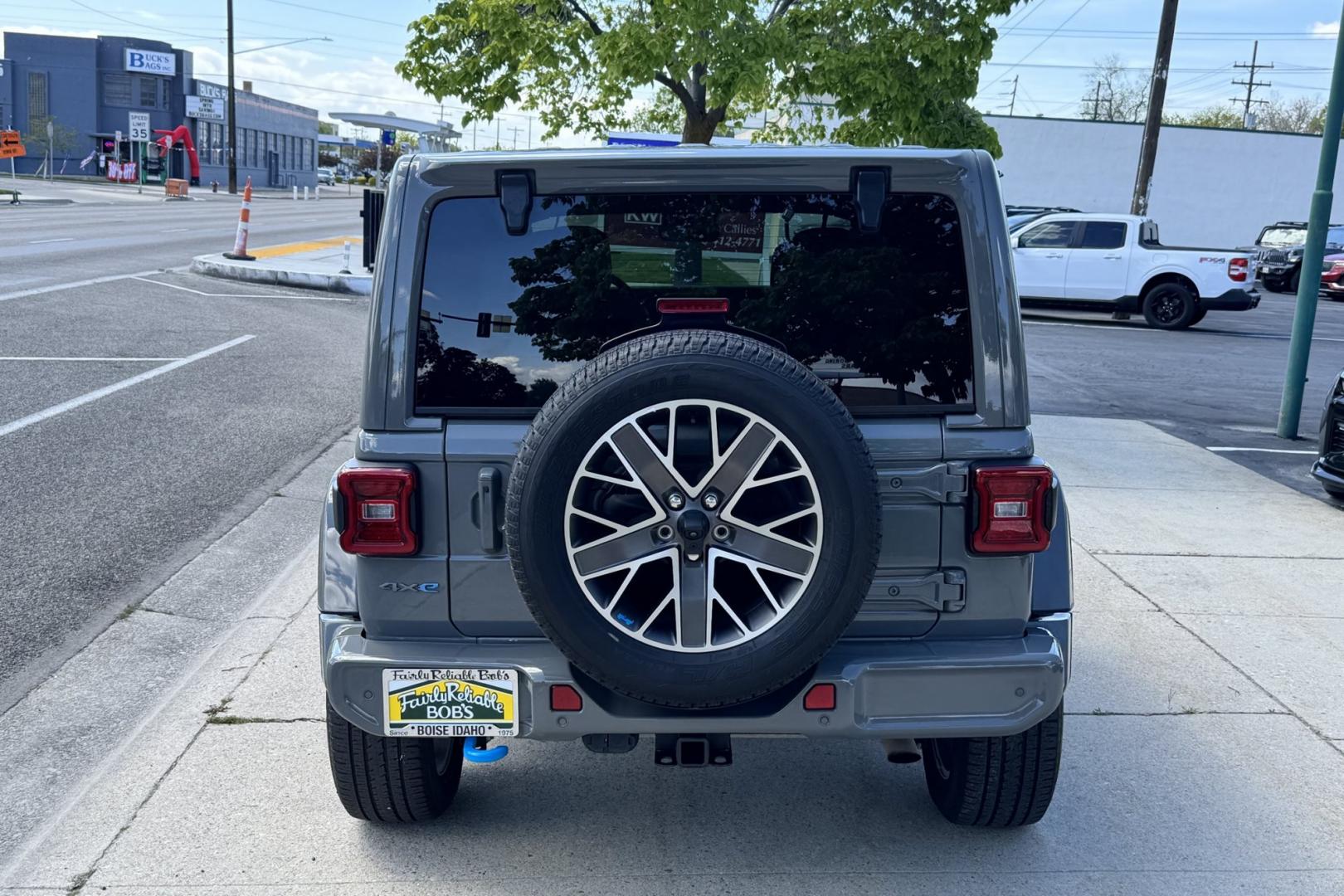 2023 Sting Gray /Black Jeep Wrangler Unlimited Sahara High Altitude (1C4JJXP64PW) with an 4 Cyl 2.0 Liter Hybrid Turbo engine, Automatic 8 Speed transmission, located at 2304 W. Main St., Boise, ID, 83702, (208) 342-7777, 43.622105, -116.218658 - Ready To Play And Get Great Fuel Economy! - Photo#1
