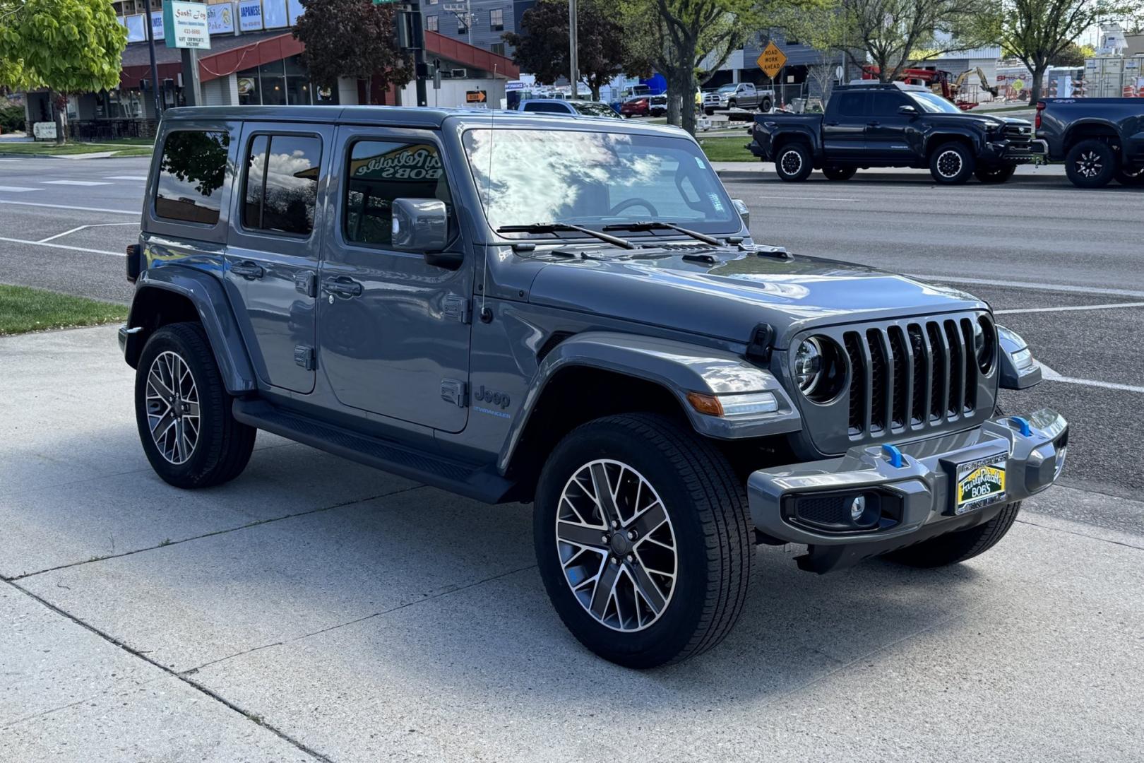 2023 Sting Gray /Black Jeep Wrangler Unlimited Sahara High Altitude (1C4JJXP64PW) with an 4 Cyl 2.0 Liter Hybrid Turbo engine, Automatic 8 Speed transmission, located at 2304 W. Main St., Boise, ID, 83702, (208) 342-7777, 43.622105, -116.218658 - Ready To Play And Get Great Fuel Economy! - Photo#2