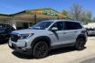 2023 Sonic Gray /Black Honda Passport EX-L HPD (5FNYF8H57PB) with an V6 3.5 Liter engine, Automatic 9 Speed transmission, located at 2304 W. Main St., Boise, ID, 83702, (208) 342-7777, 43.622105, -116.218658 - Honda Performance Development Package! Low Mileage And Clean! - Photo#0