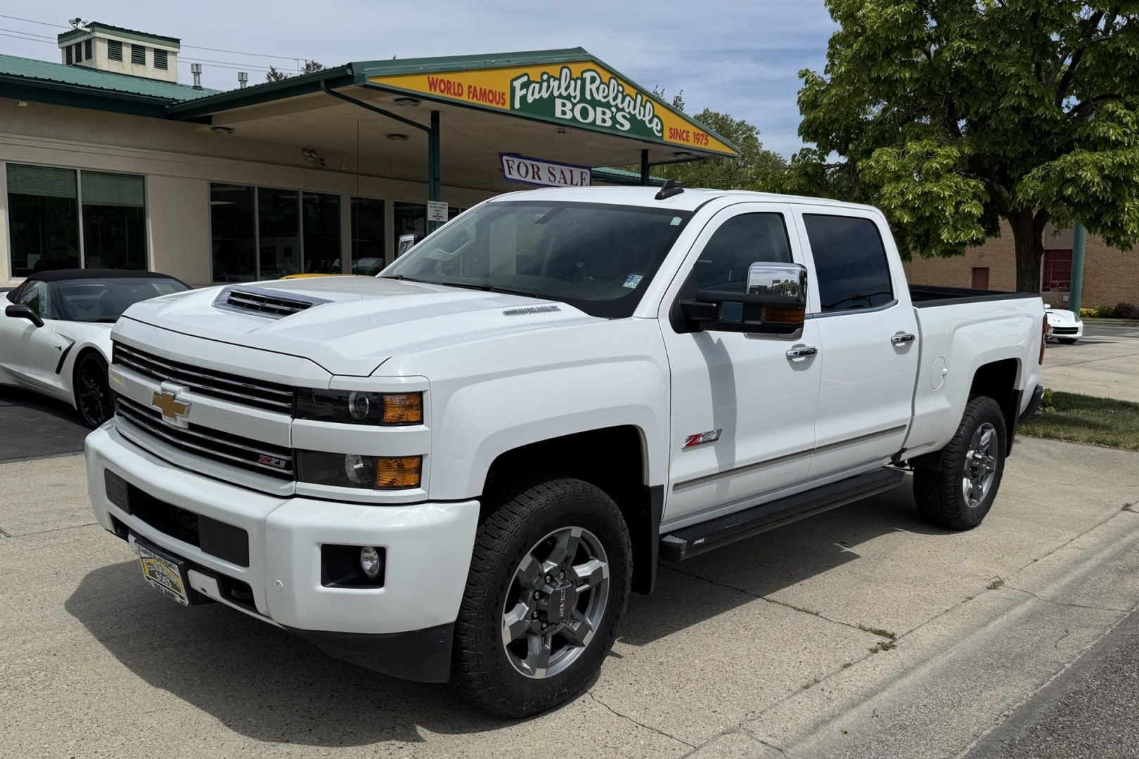 2018 Summit White /Tan Chevrolet Silverado 3500HD LTZ Z71 (1GC4K0CY2JF) with an V8 6.6 Liter Turbo Diesel engine, Allison Automatic 6 Speed transmission, located at 2304 W. Main St., Boise, ID, 83702, (208) 342-7777, 43.622105, -116.218658 - Clean Low Mileage Diesel!- Photo#0