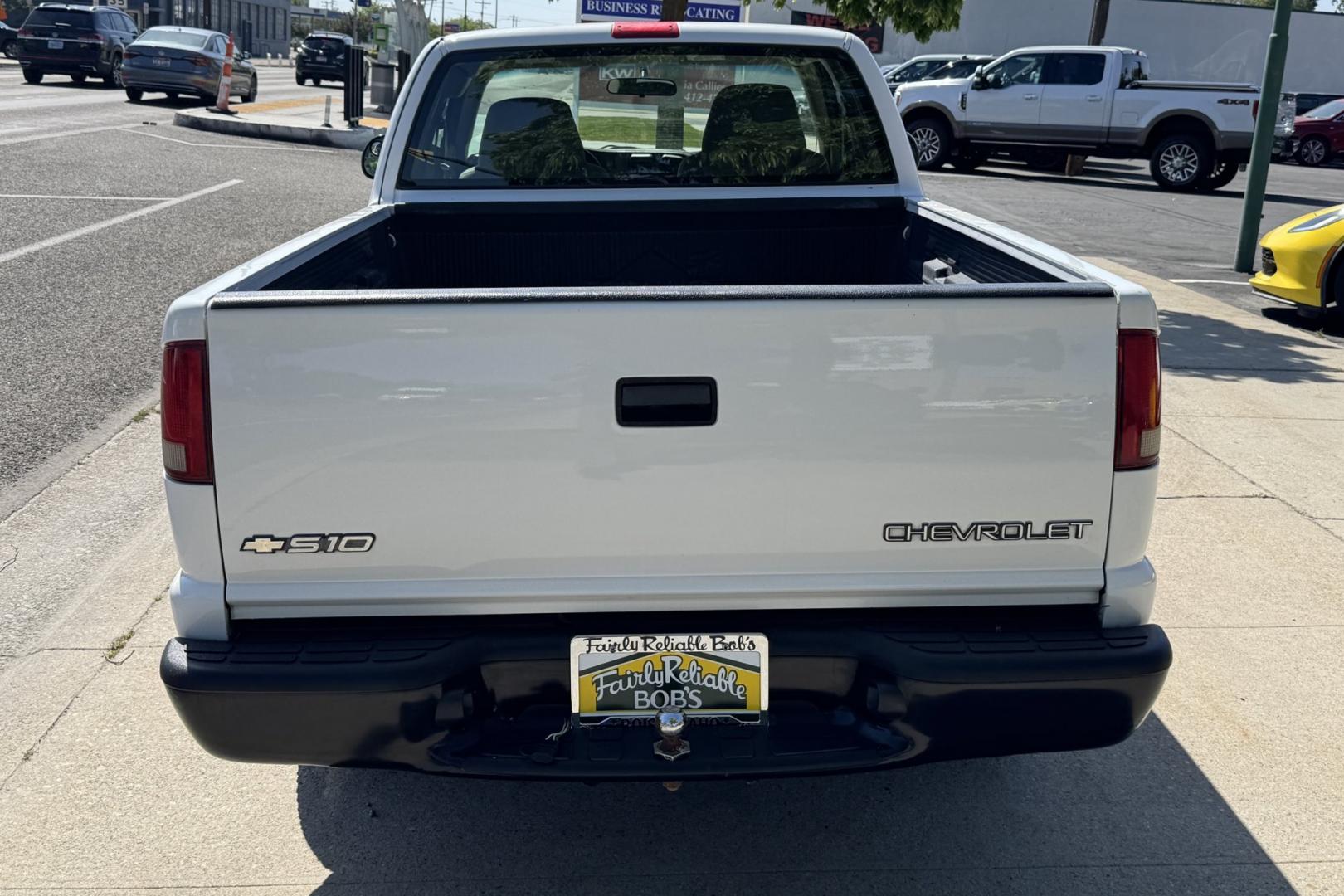 2003 White /Gray Chevrolet S-10 (1GCCS19H638) with an 4 Cyl 2.2 Liter engine, 5 Speed Manual transmission, located at 2304 W. Main St., Boise, ID, 83702, (208) 342-7777, 43.622105, -116.218658 - Hard To Find This Clean! New Tires Too!- Photo#1
