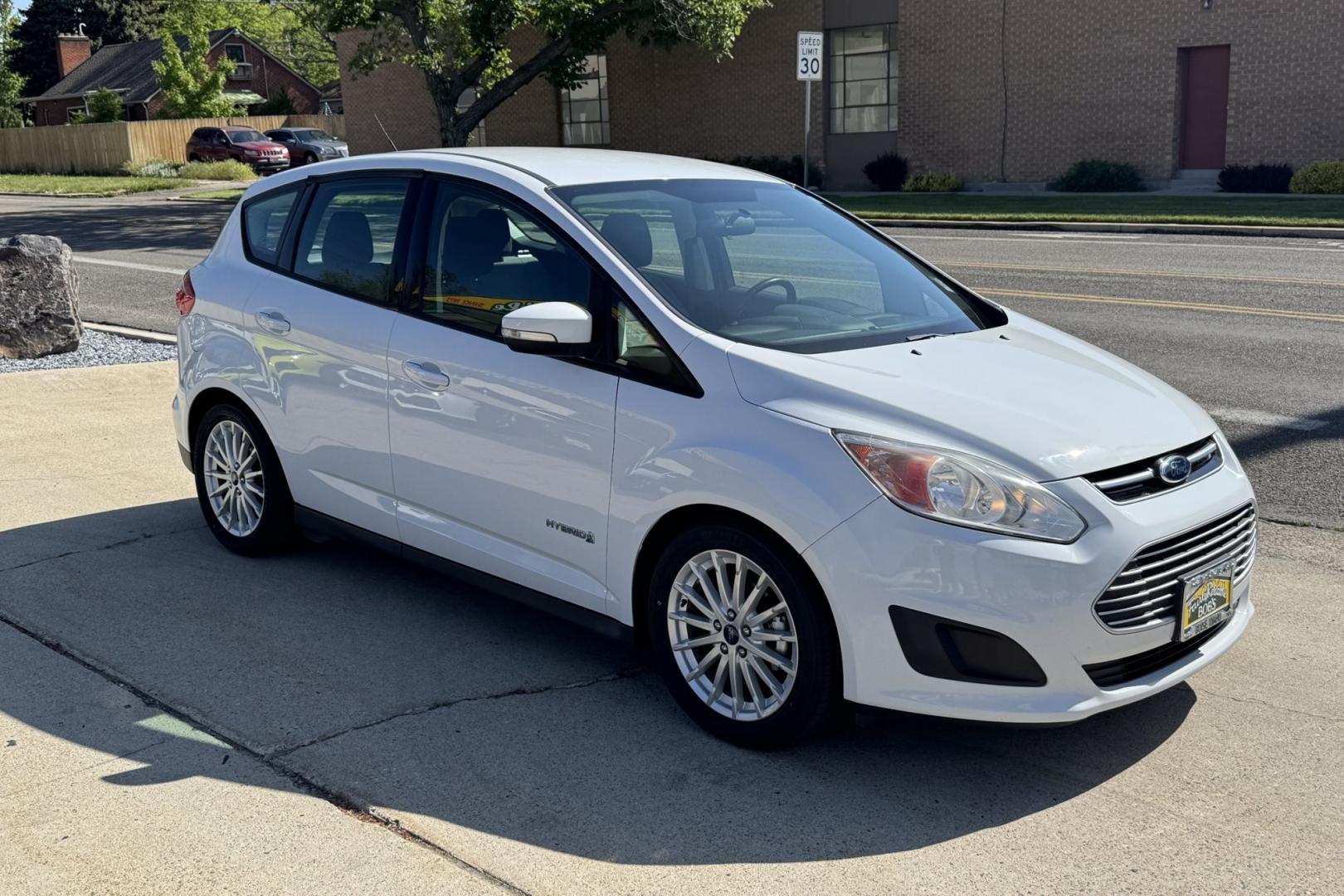 2016 Oxford White /Black Ford C-Max SE (1FADP5AU8GL) with an 4 Cyl 2.0 Liter Hybrid engine, Automatic transmission, located at 2304 W. Main St., Boise, ID, 83702, (208) 342-7777, 43.622105, -116.218658 - Great Fuel Economy! Low Mileage Too! - Photo#2