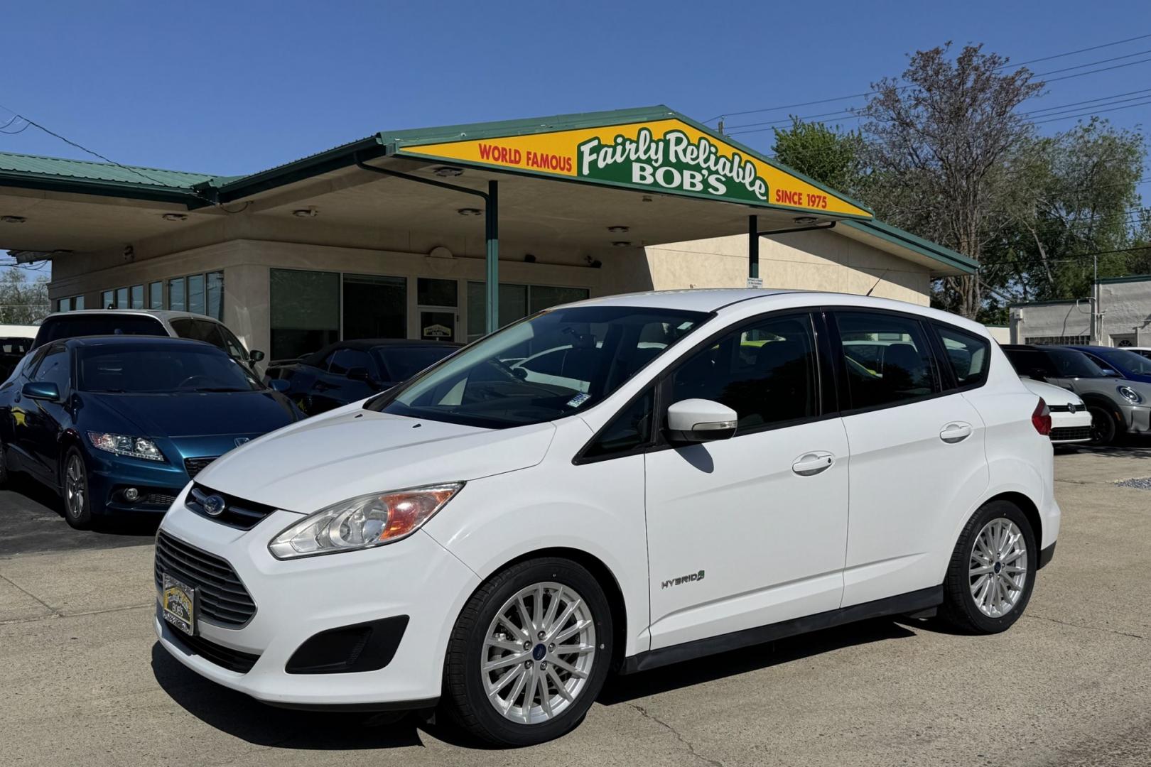 2016 Oxford White /Black Ford C-Max SE (1FADP5AU8GL) with an 4 Cyl 2.0 Liter Hybrid engine, Automatic transmission, located at 2304 W. Main St., Boise, ID, 83702, (208) 342-7777, 43.622105, -116.218658 - Great Fuel Economy! Low Mileage Too! - Photo#0