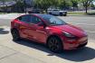 2021 Red Multi-Coat /Black Tesla Y Dual Motor Long Range (5YJYGDEE2MF) with an 75 kWh Lithium-ion battery engine, Automatic transmission, located at 2304 W. Main St., Boise, ID, 83702, (208) 342-7777, 43.622105, -116.218658 - Photo#2