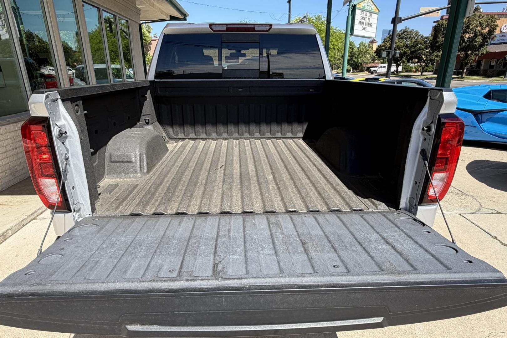 2020 Silver /Black GMC Sierra Elevation (1GTU9CED1LZ) with an V8 5.3 Liter engine, Automatic 8 Speed transmission, located at 2304 W. Main St., Boise, ID, 83702, (208) 342-7777, 43.622105, -116.218658 - Ready To Haul!- Photo#22
