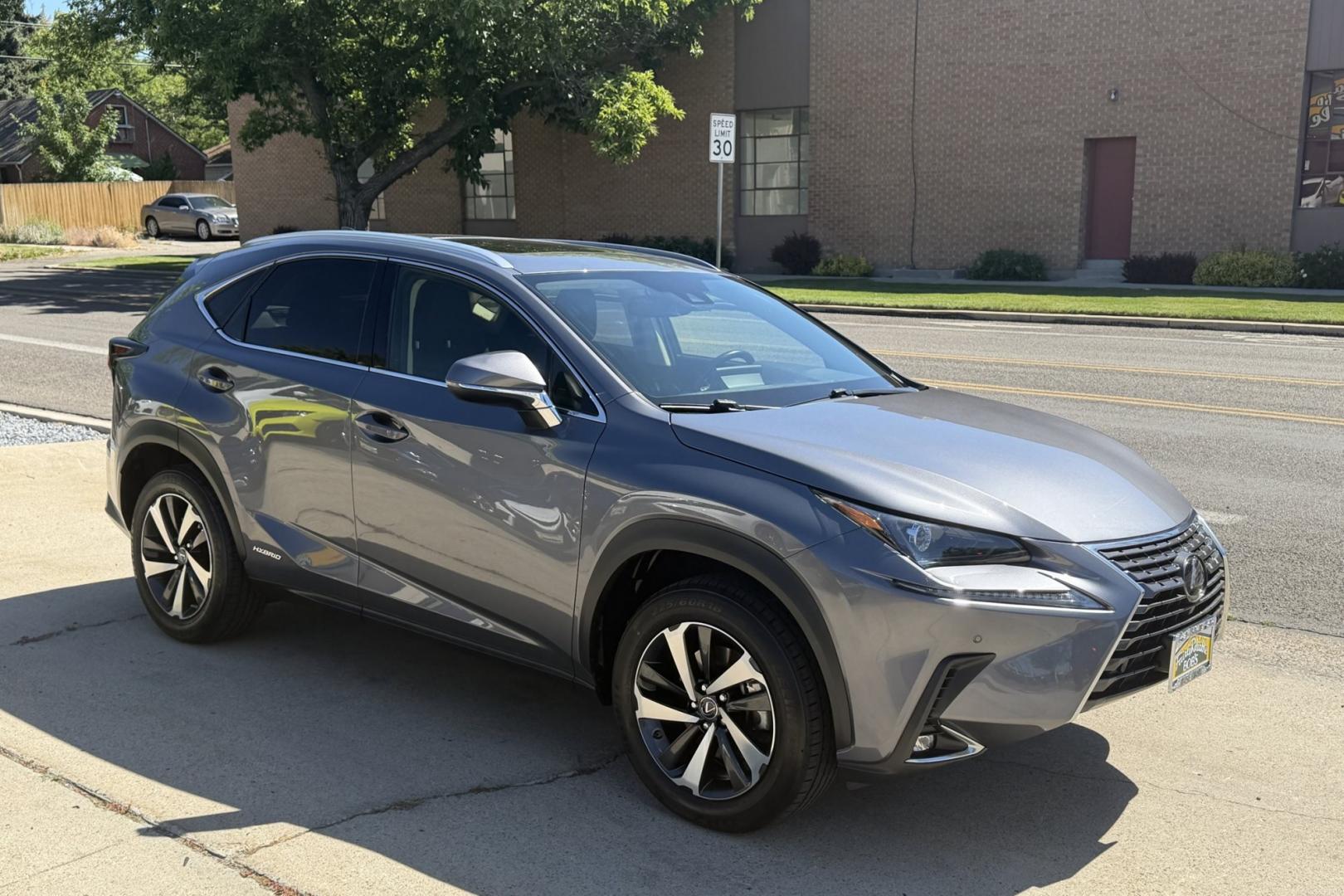 2020 Nebula Gray Pearl /Black Lexus NX 300h 300h (JTJGJRDZ4L2) with an 4 Cyl 2.5 Liter Hybrid engine, Automatic transmission, located at 2304 W. Main St., Boise, ID, 83702, (208) 342-7777, 43.622105, -116.218658 - Hard To Find, Low Mileage Hybrid! New Tires Too! - Photo#2